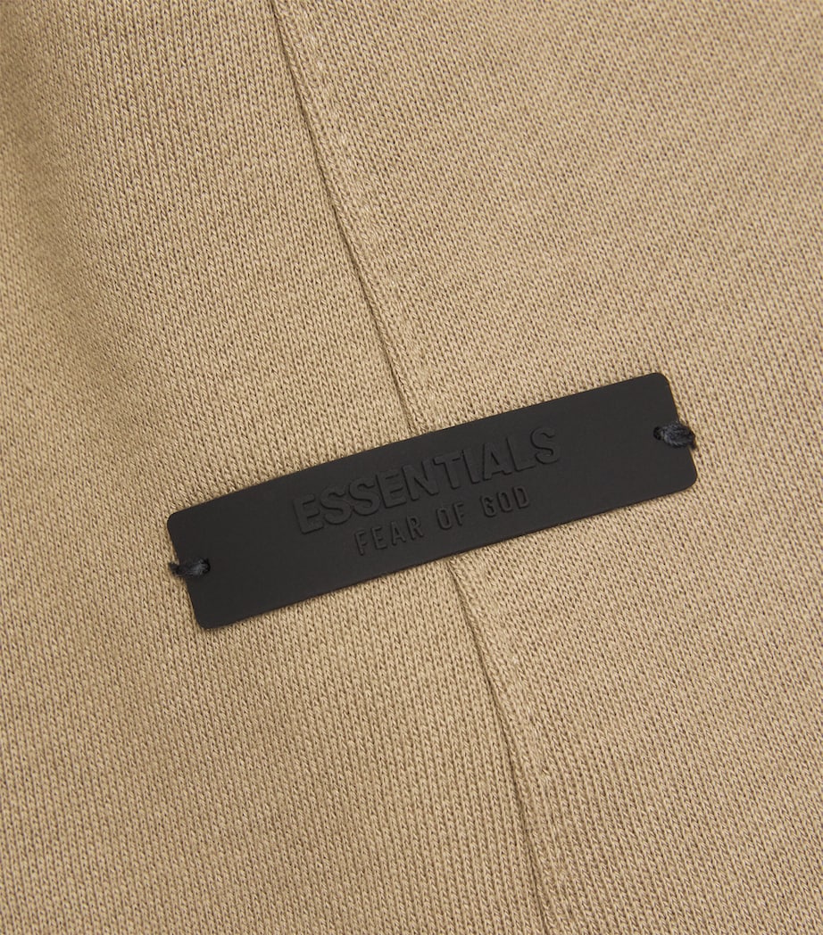 FEAR OF GOD ESSENTIALS Mens Cotton-Blend Logo Sweatpants Desert Sand Image 5