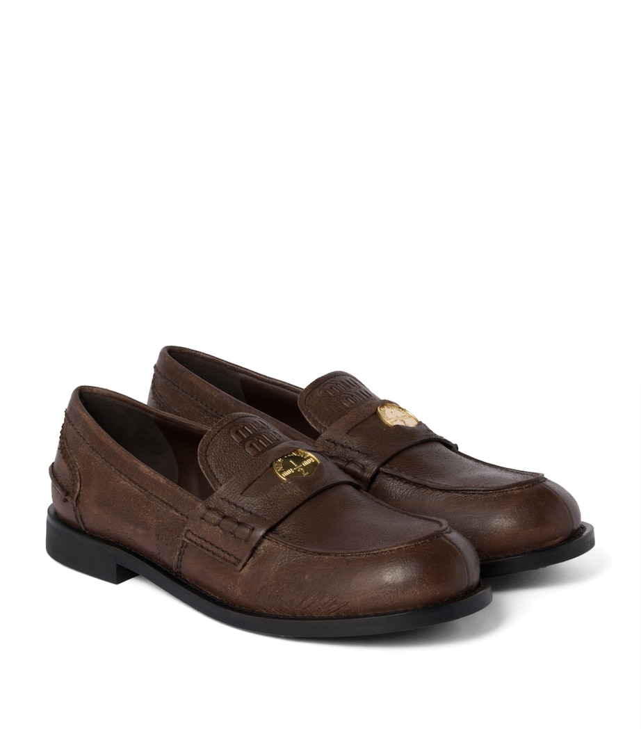 Miu Miu Leather Distressed Penny Loafers Image 1