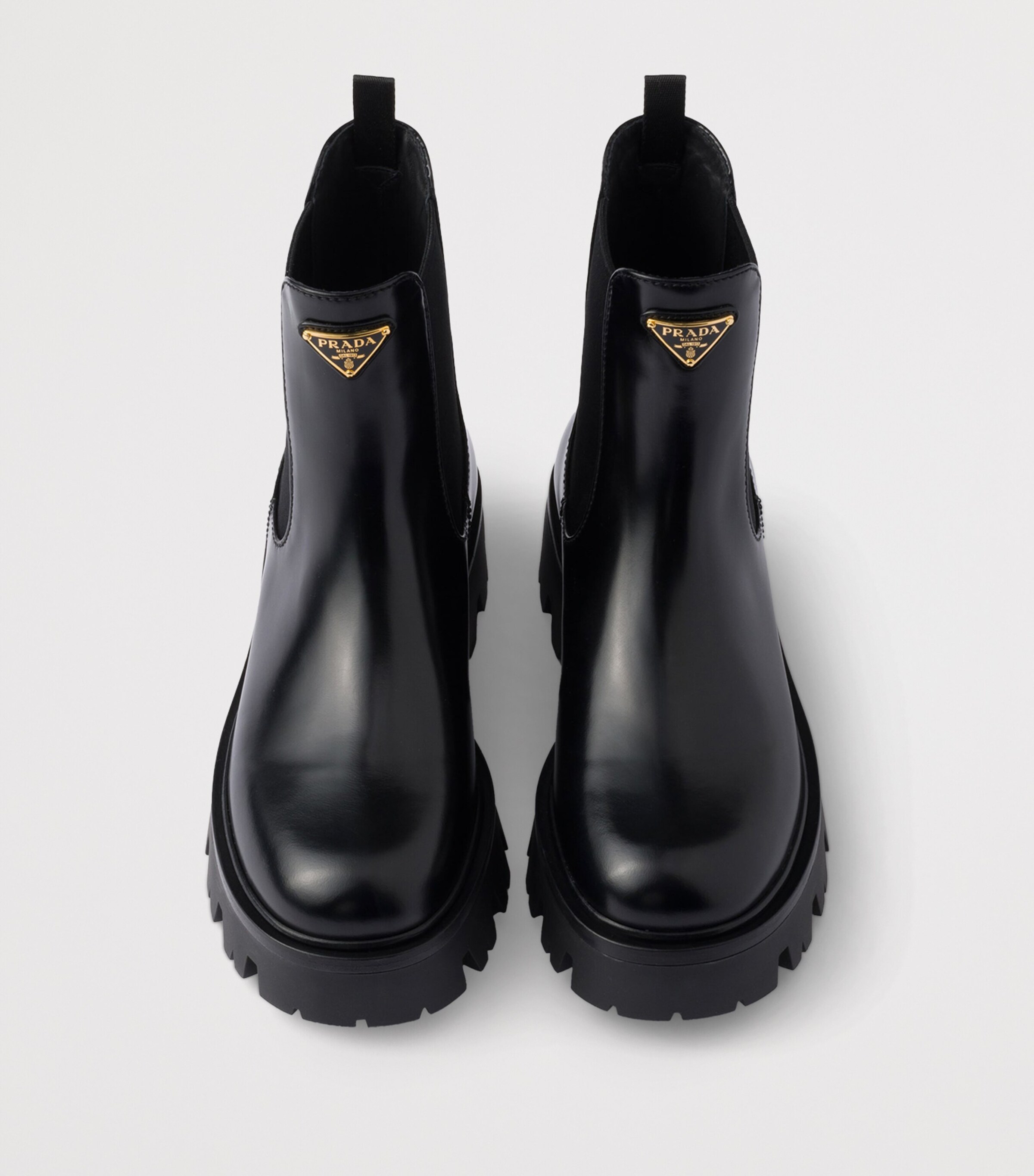 Prada Black Brushed Leather Ankle Boots | Harrods UK