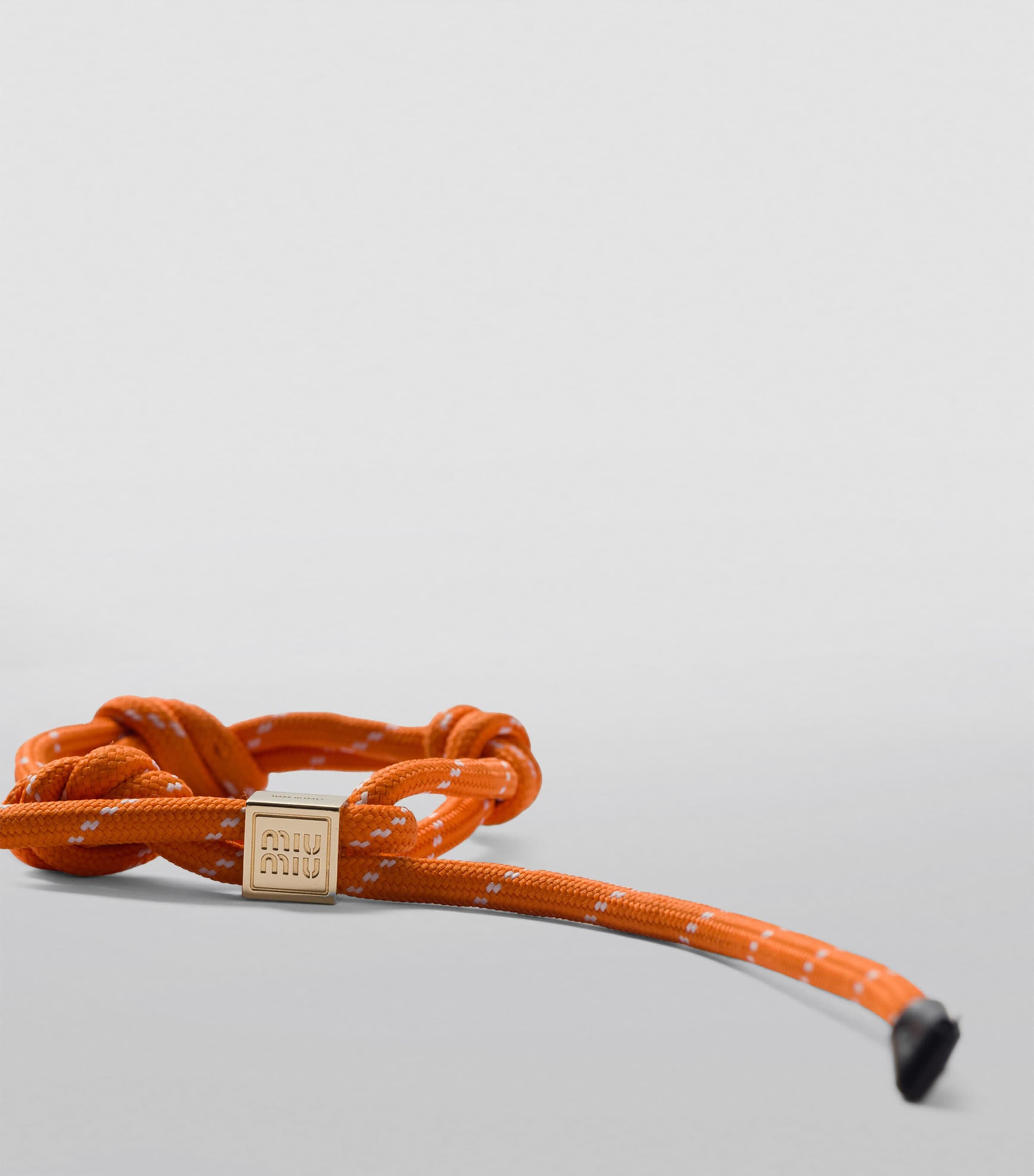 【送料&関税込】Miu Miu Orange Fabric Bracelet Miu Miu logo-charm Rope Bracelet | Orange | FARFETCH