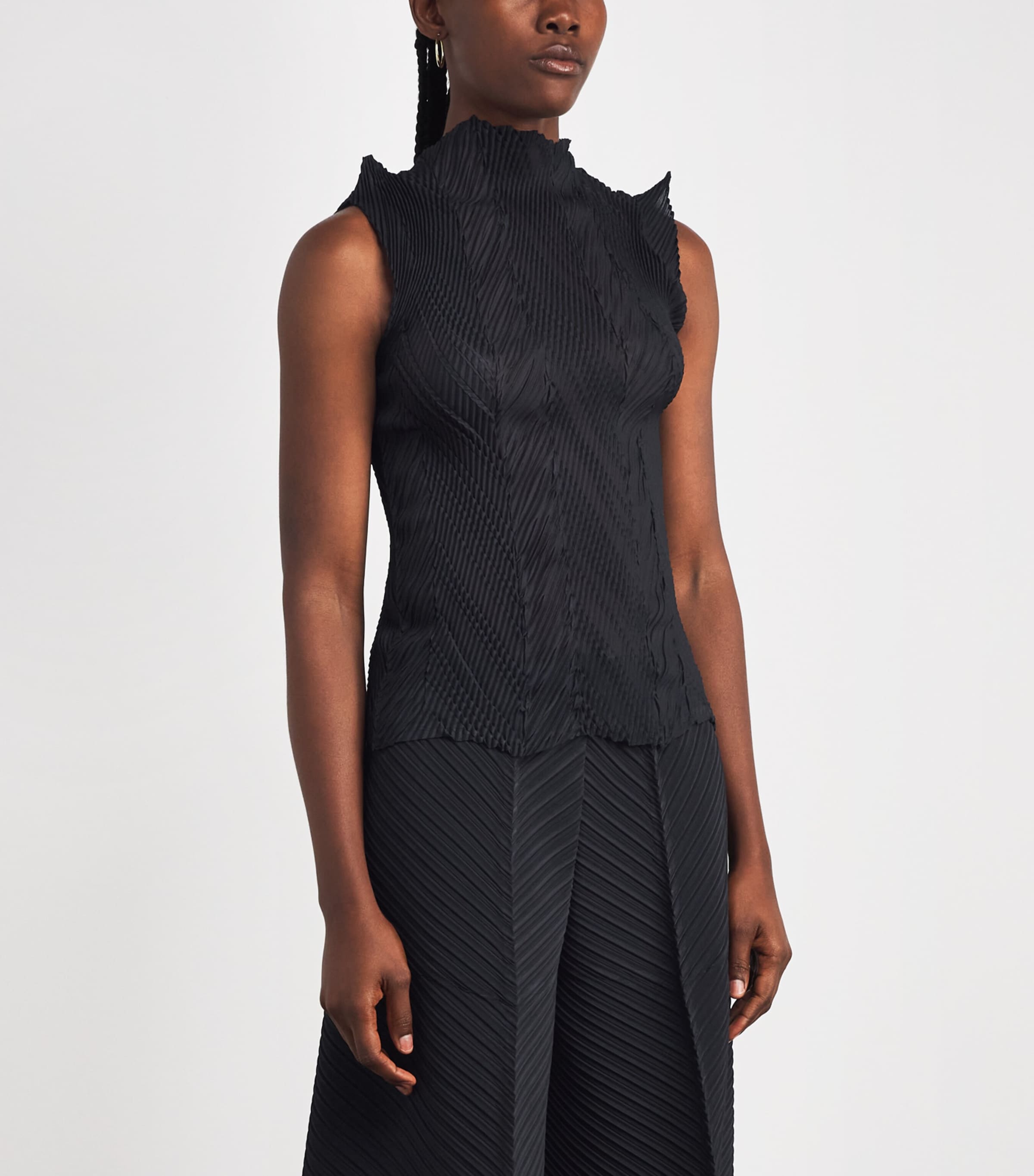 Issey Miyake Black Zigzag Pleats Sleeveless Top | Harrods US Issey Miyake Black Zigzag Pleats Sleeveless Top | Harrods US