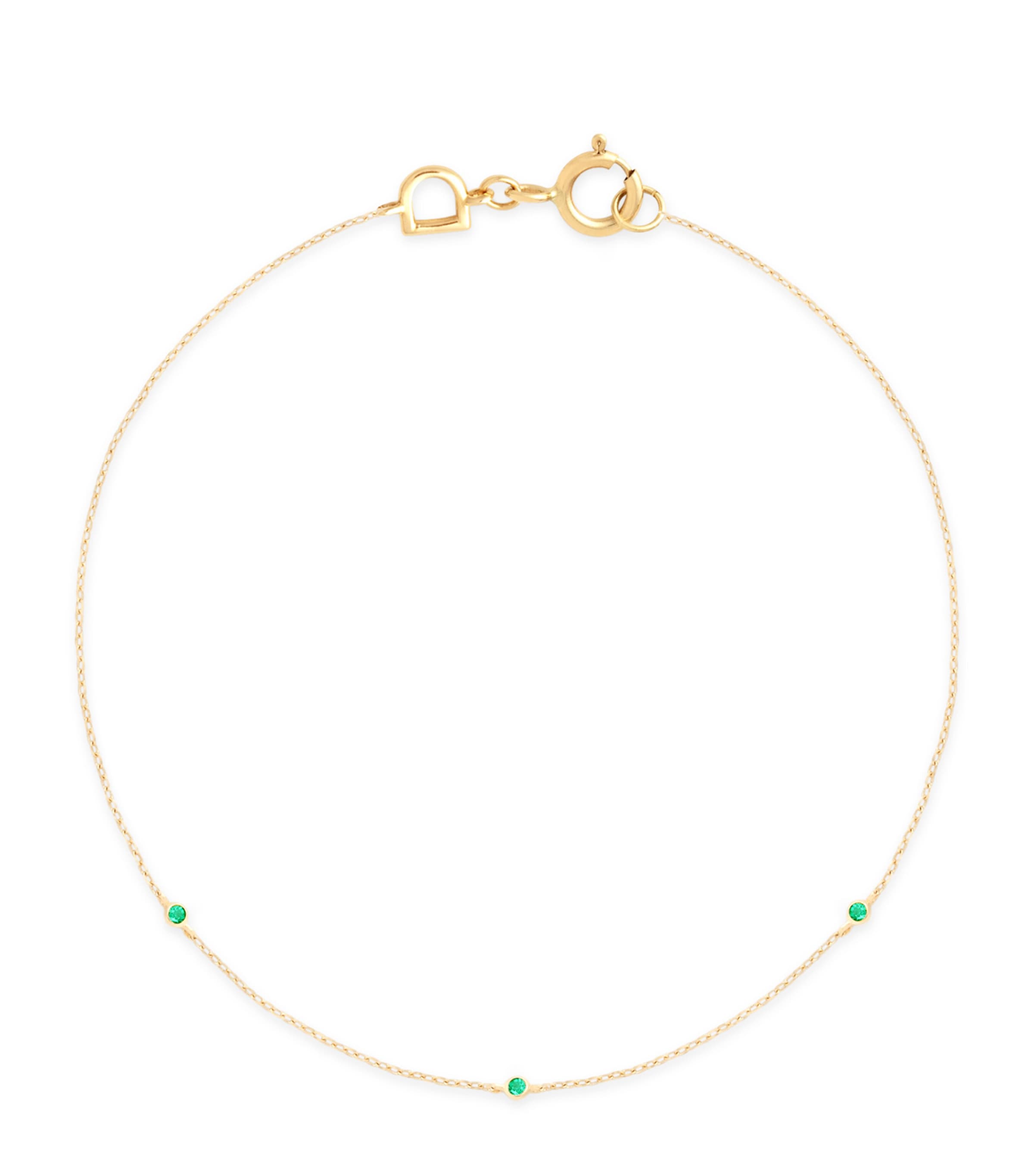 Astrid & Miyu Yellow Gold And Emerald Charm Bracelet In Gold