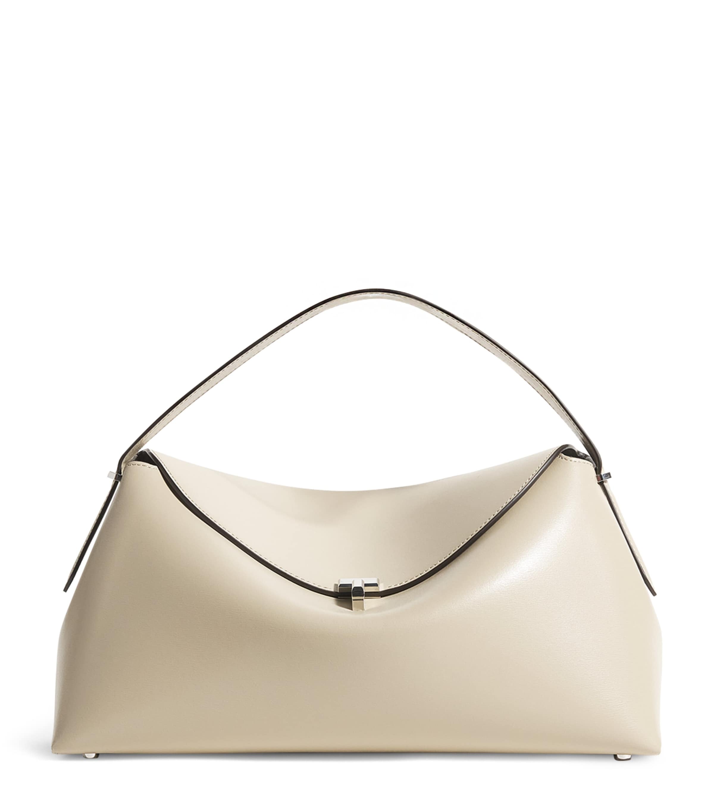 Totême Leather T-Lock Top-Handle Bag | Harrods UK