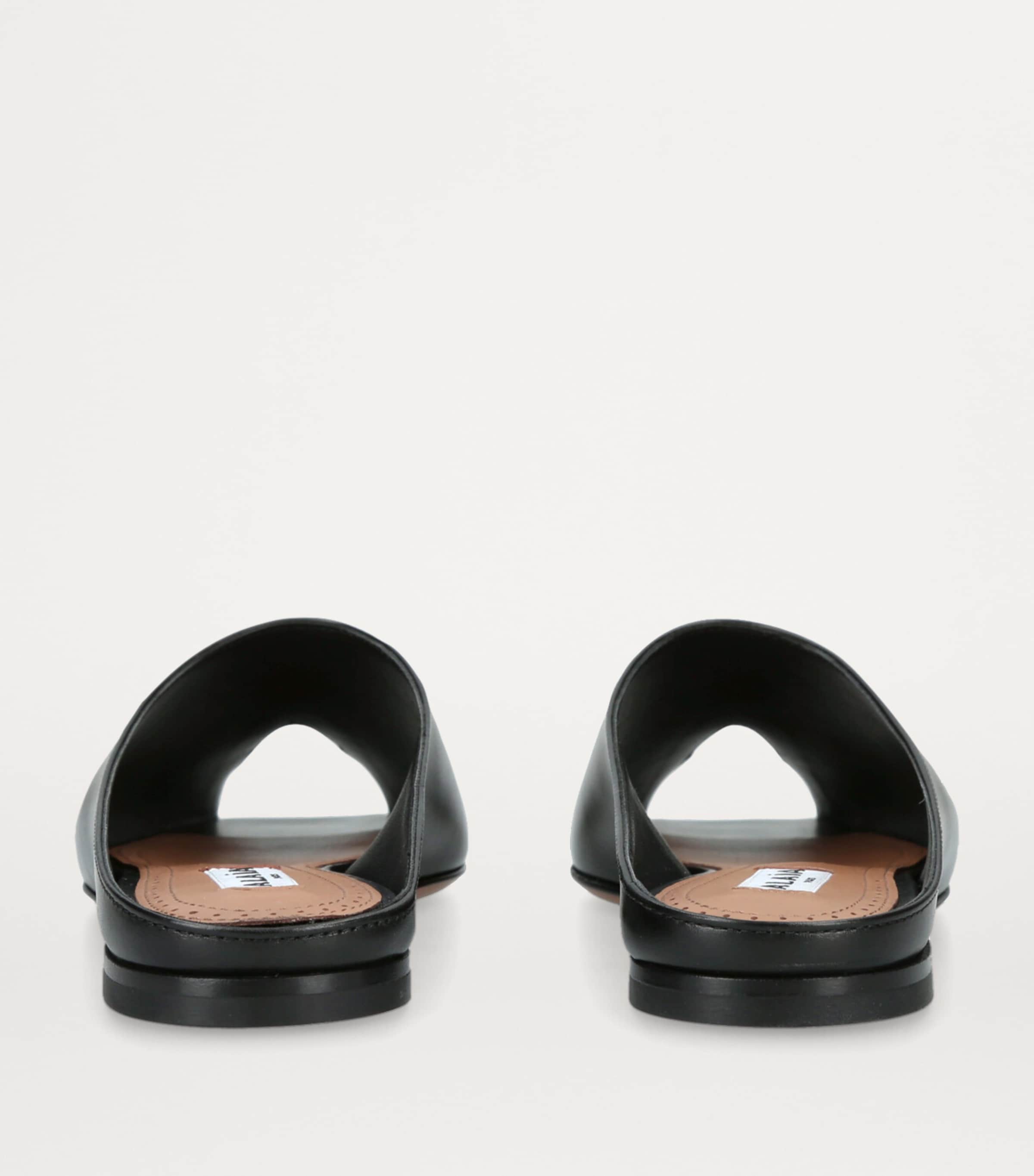 【関税込み】ALAIA ブラック Spike ミュール Spike leather mules in black - Alaia | Mytheresa