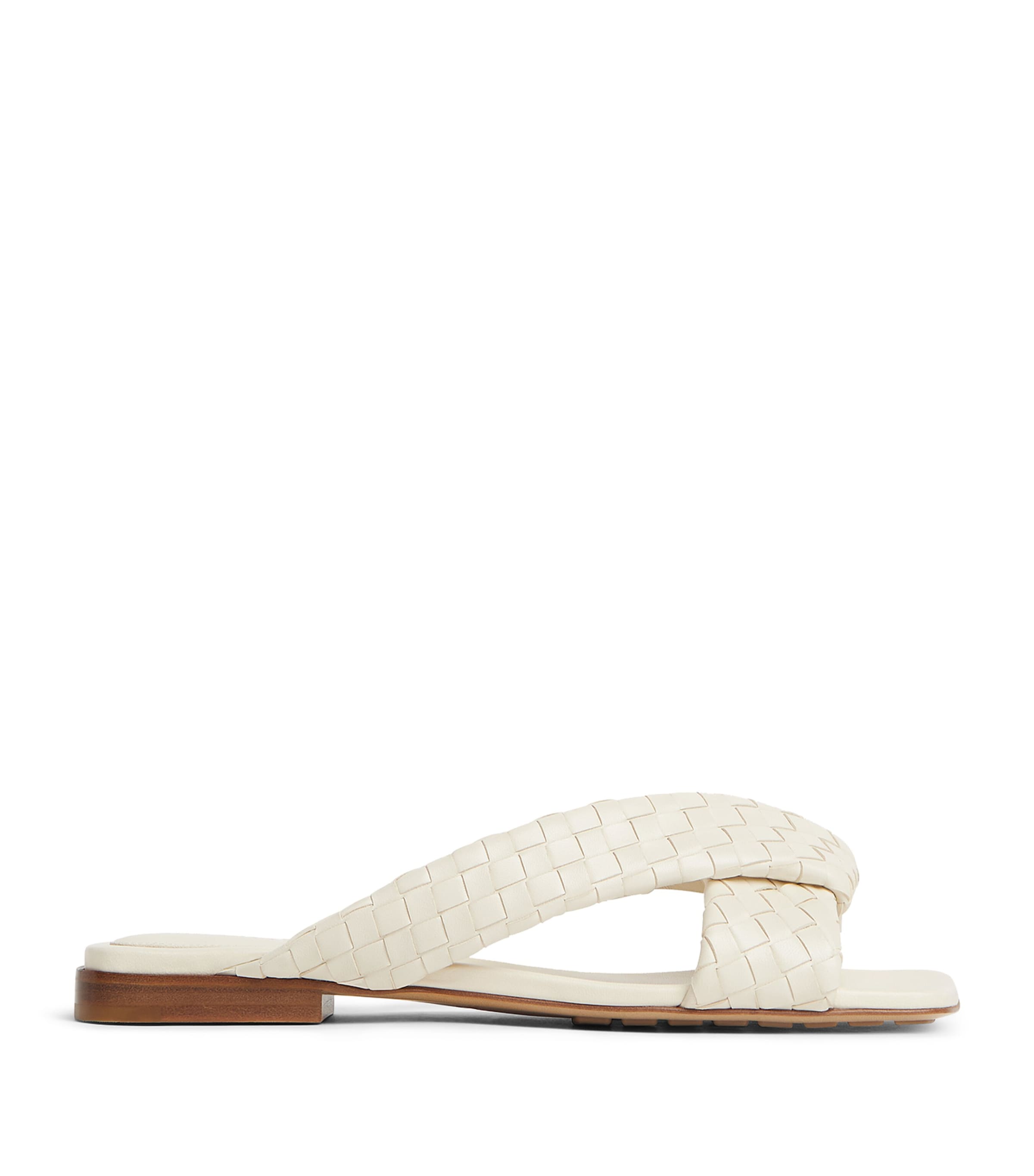 Bottega Veneta Leather Intrecciato Riva Flat Mules | Holiday Shop | Womens | Sandals | Women Shoes | Flats | Mules | Flat Mules | Designers | Bottega Veneta | Women Wardrobe Essentials | Shoes