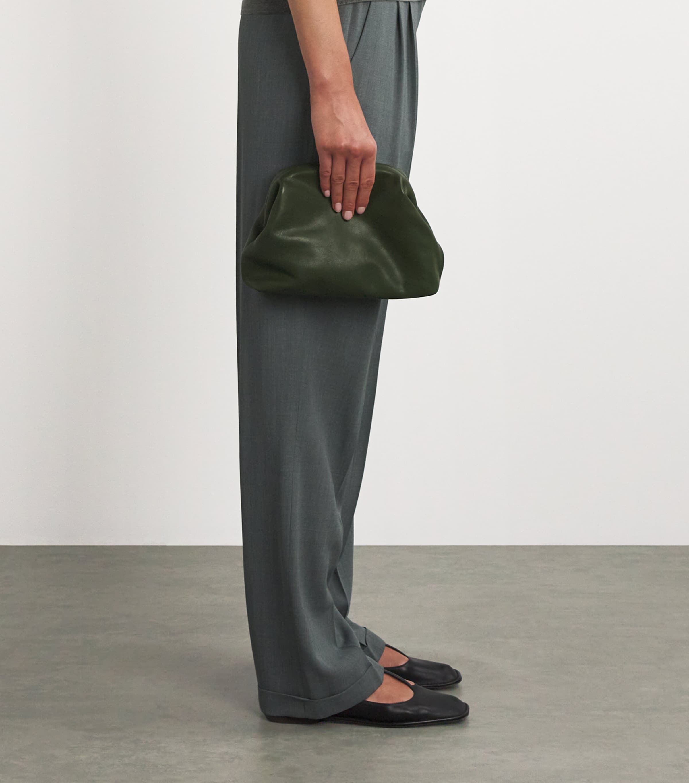 The Row Mira Leather Clutch Bag | Harrods TW