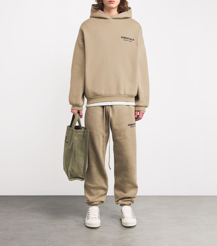 FEAR OF GOD ESSENTIALS Mens Cotton-Blend Logo Sweatpants Desert Sand Image 2