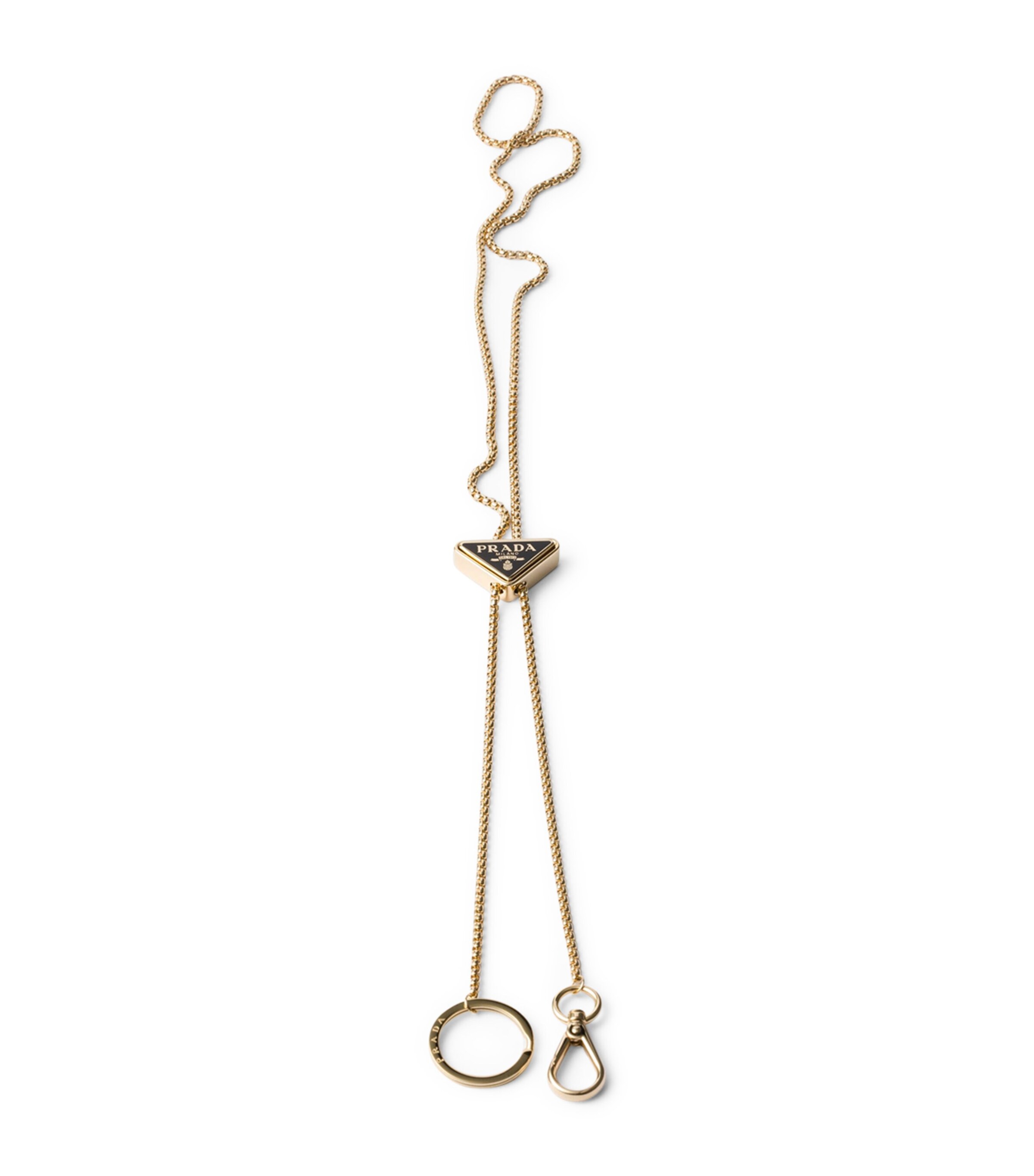 Prada Metal Keychain In Gold/black