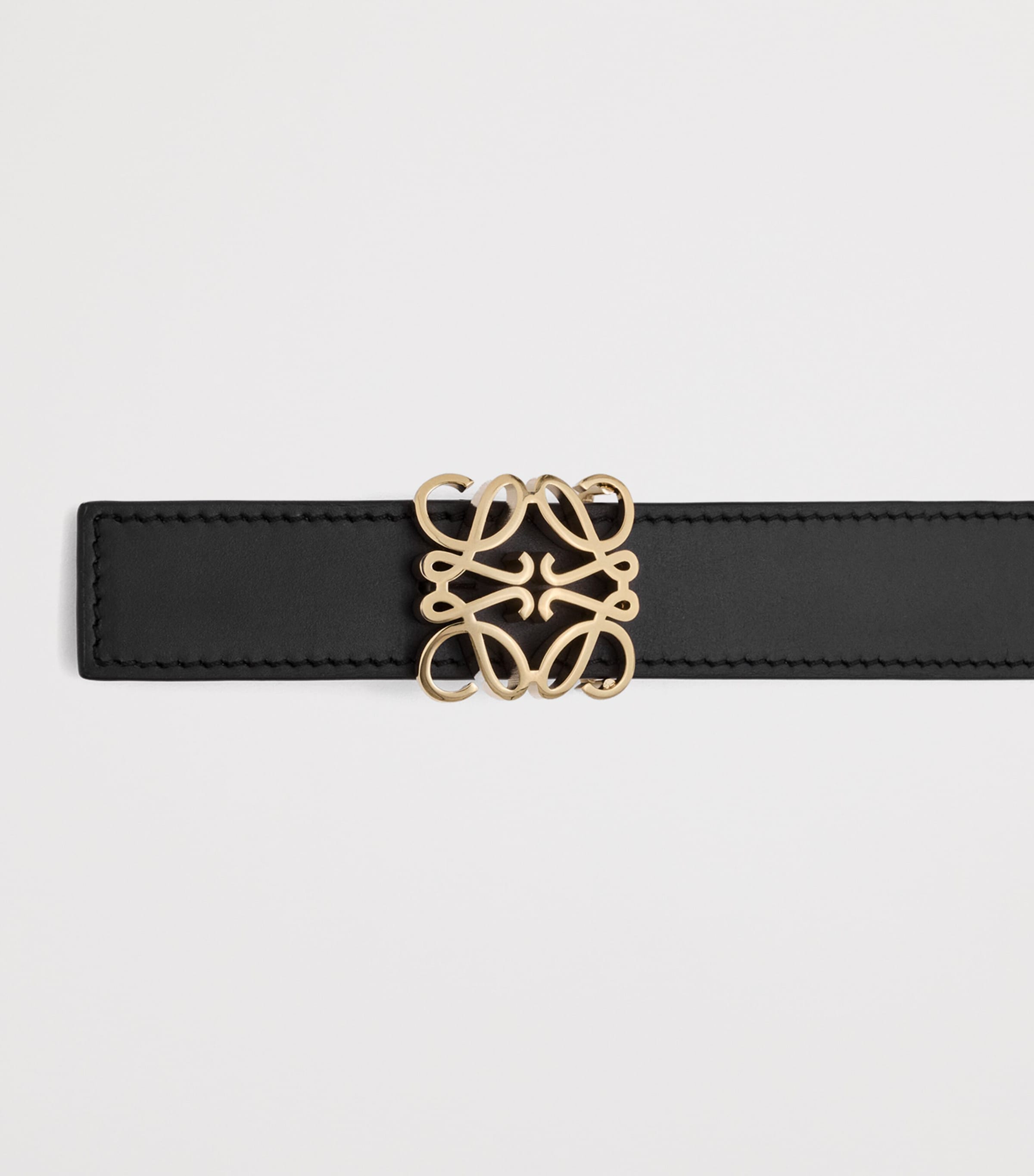 LOEWE Black Leather Reversible Anagram Bombé Belt | Harrods UK