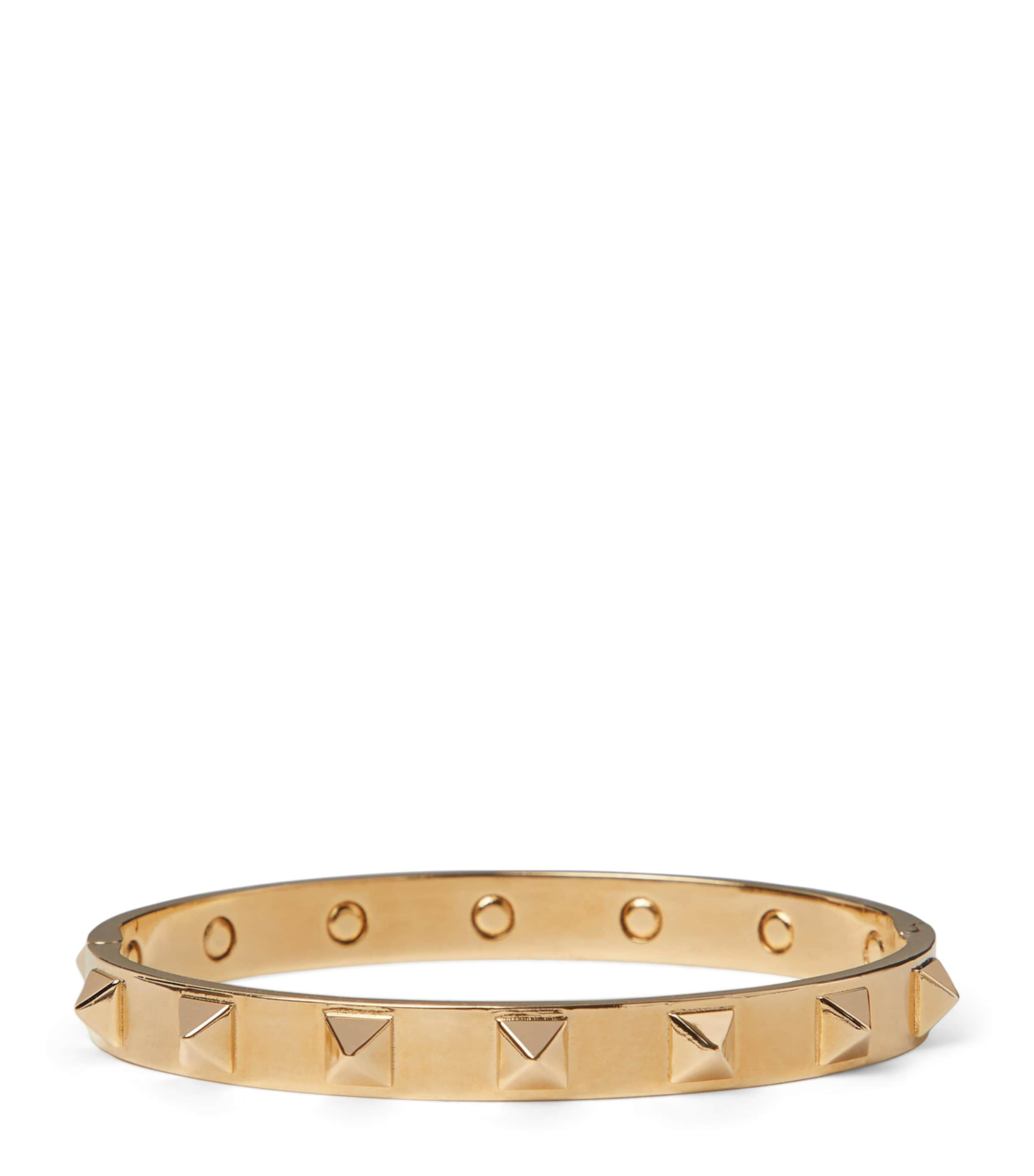 Shop Valentino Rockstud Bangle In Gold