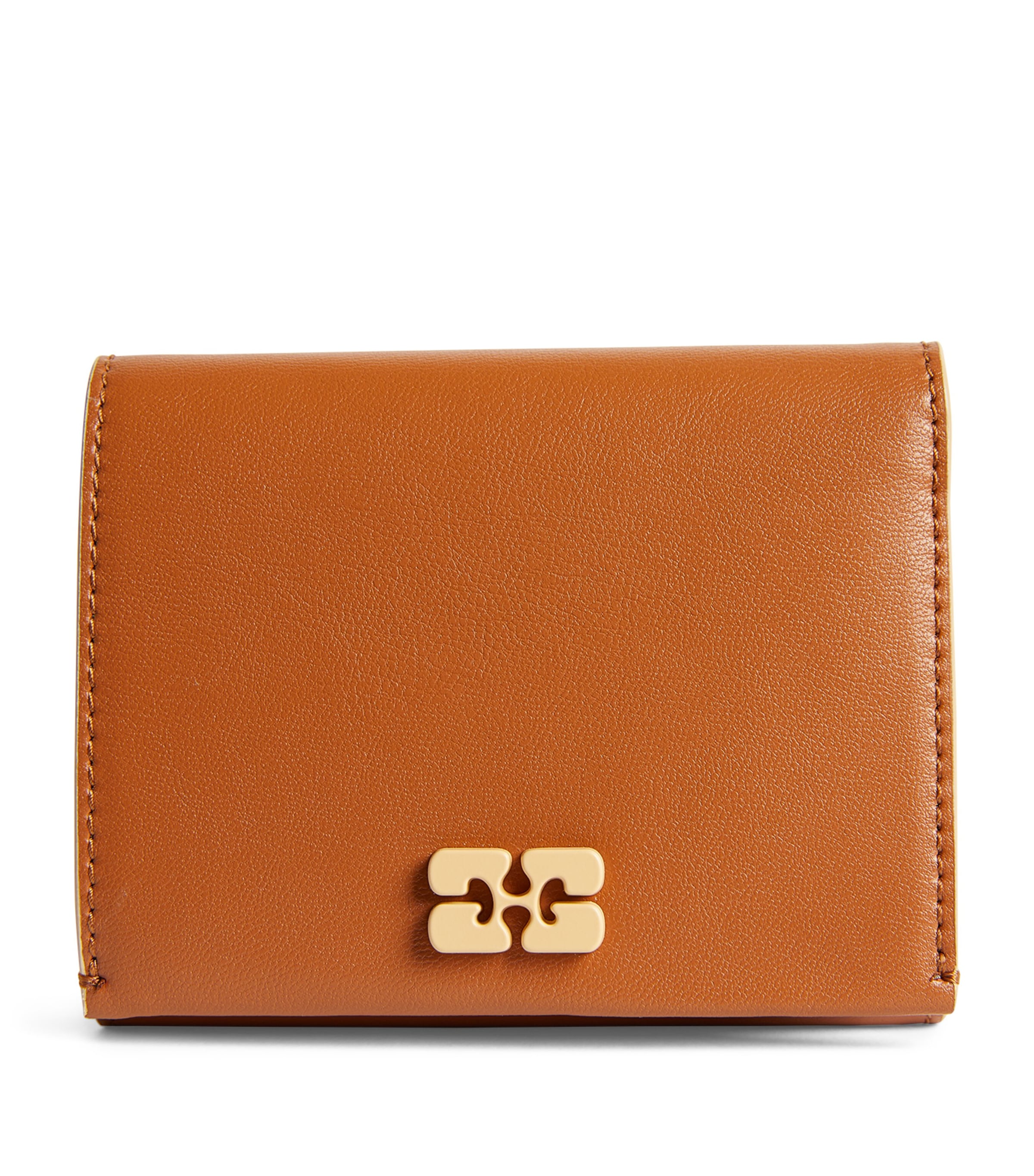 Shop Ganni Recycled Leather Bou Trifold Wallet In Brown