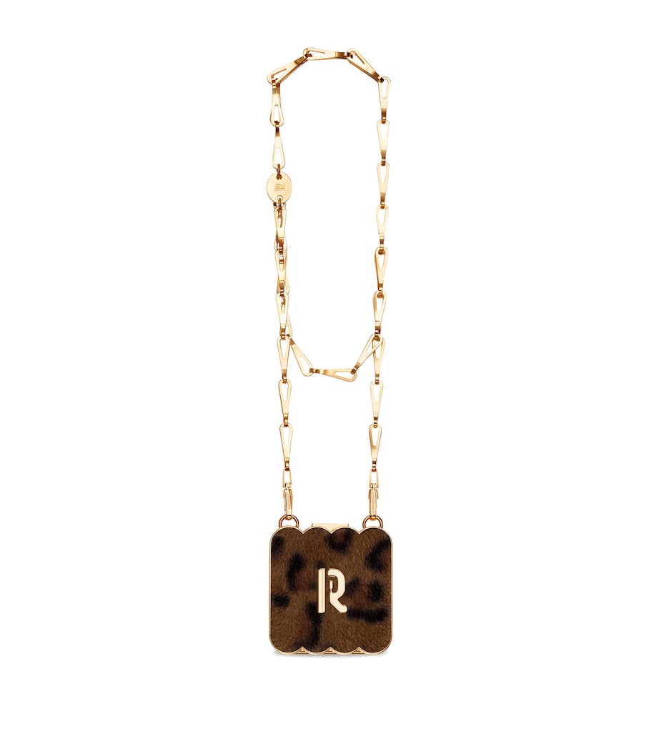 Rabanne Antique Gold Luminizer and Leopard Clutch Bag Image 1