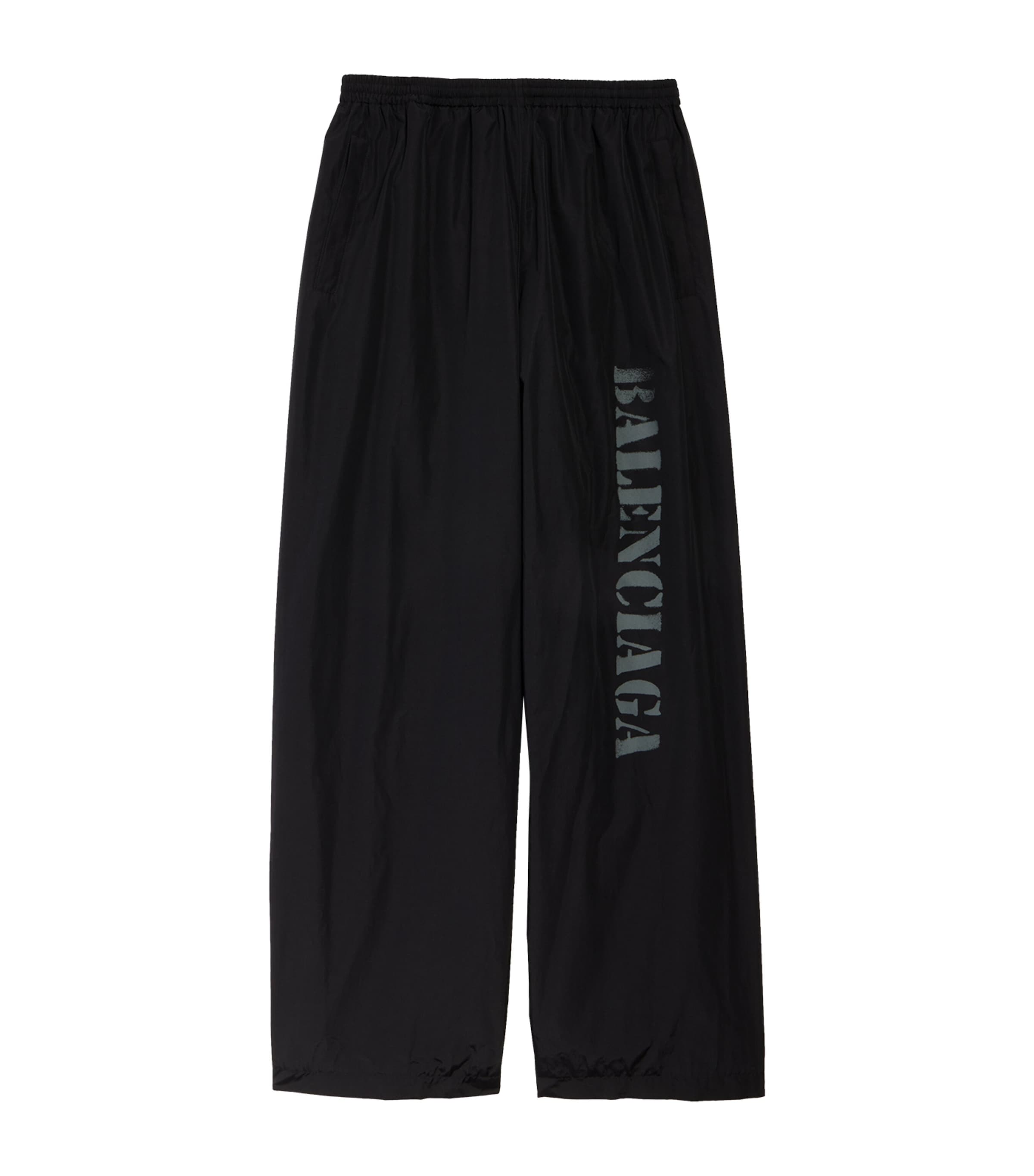 BALENCIAGA OVERSIZED STENCIL LOGO TRACK PANTS 