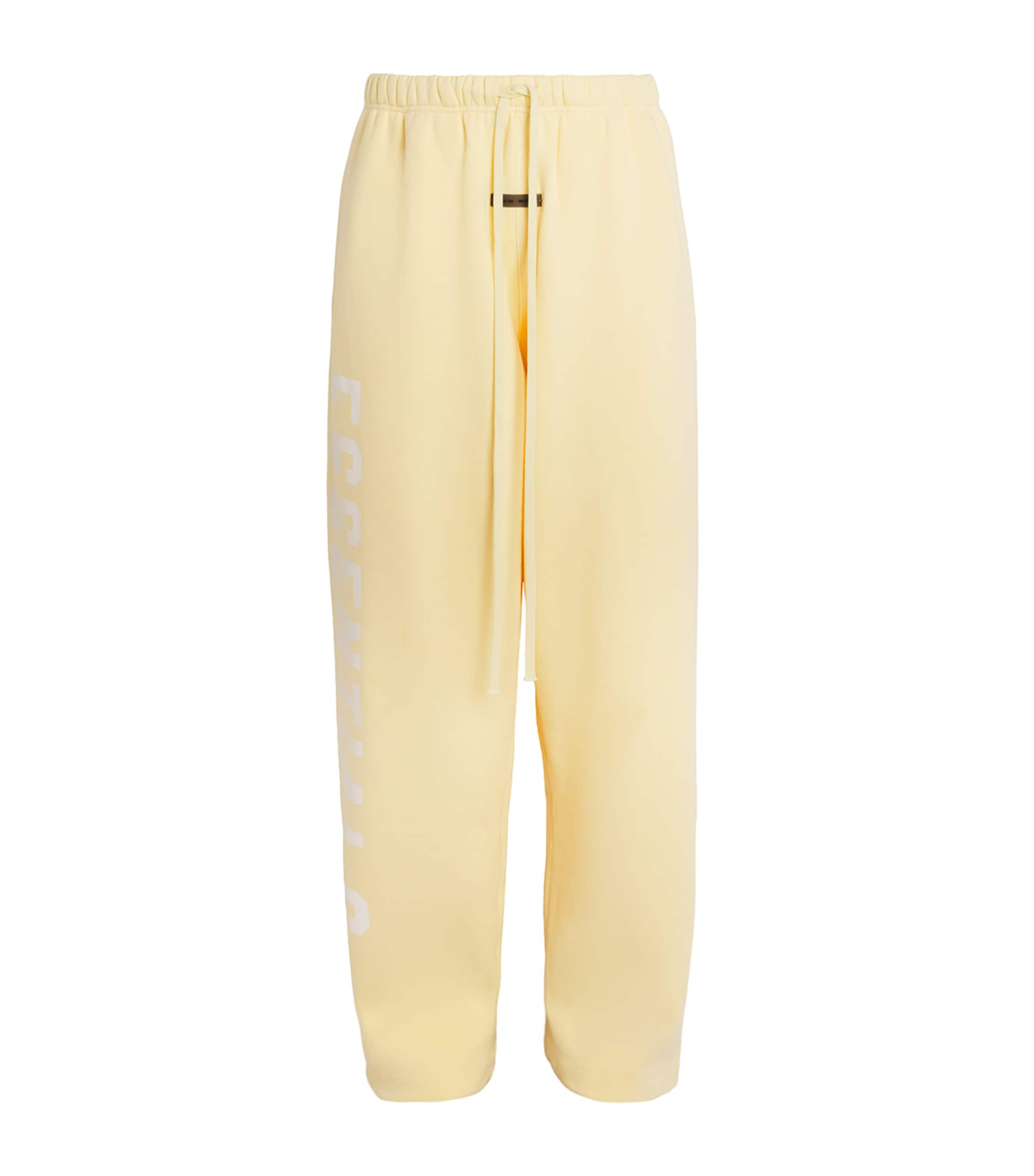 FEAR OF GOD ESSENTIALS Mens Cotton-Blend Wide-Leg Sweatpants Garden Yellow Image 1