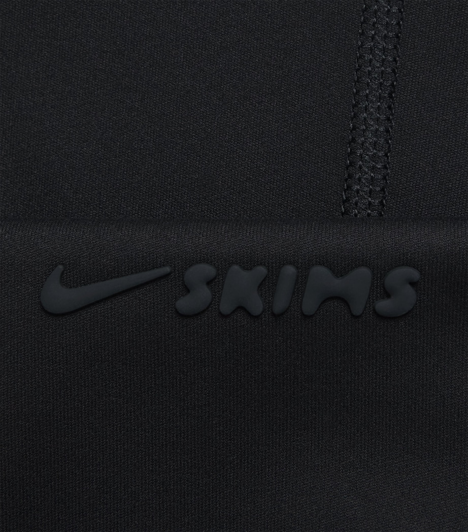 NikeSKIMS Womens NikeSKIMS Foldover Slim Flare Leggings Obsidian Image 2