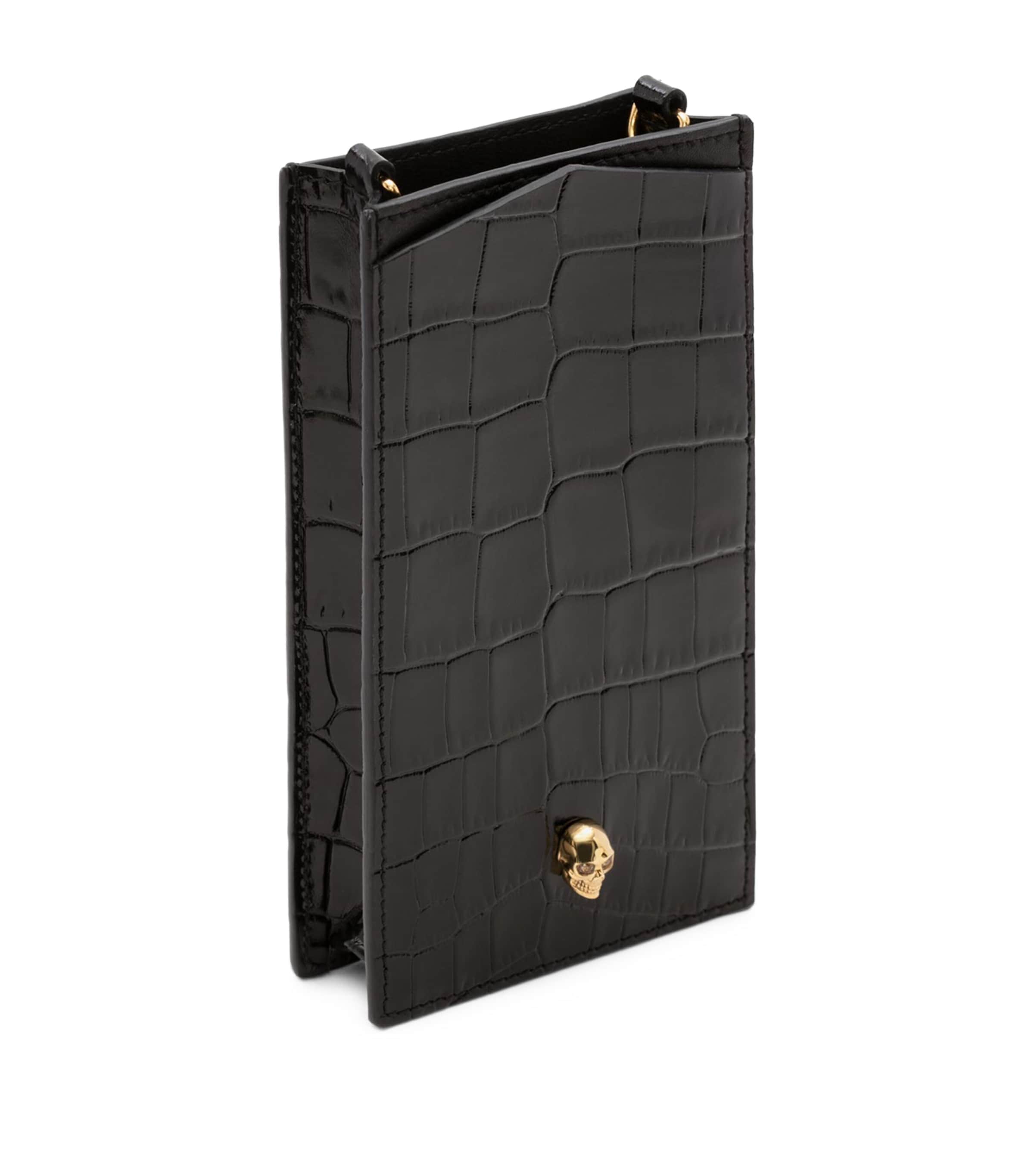 McQueen Skull-embellished croc-embossed leather phone case