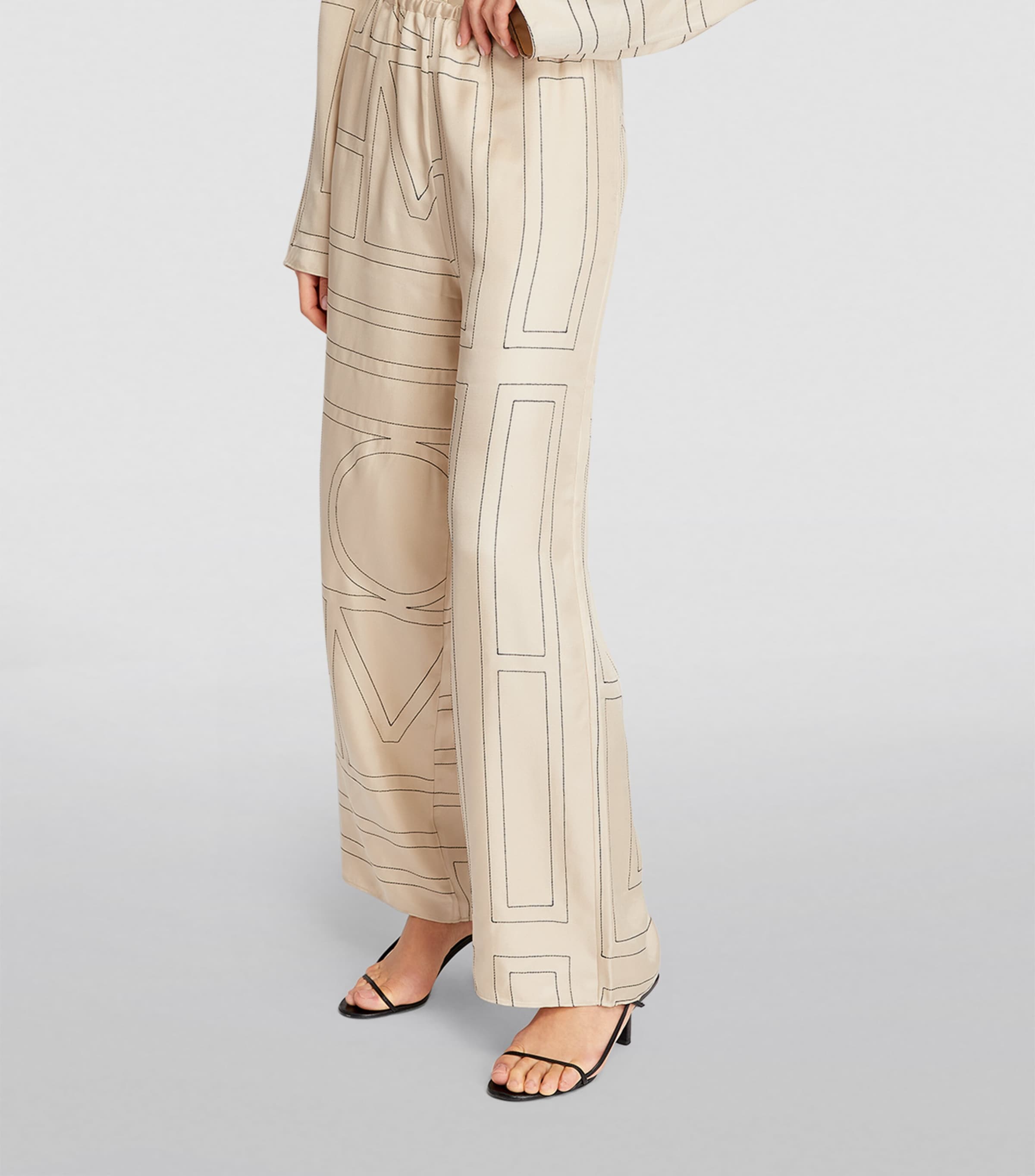 Totême Silk Monogram Trousers | Harrods UK