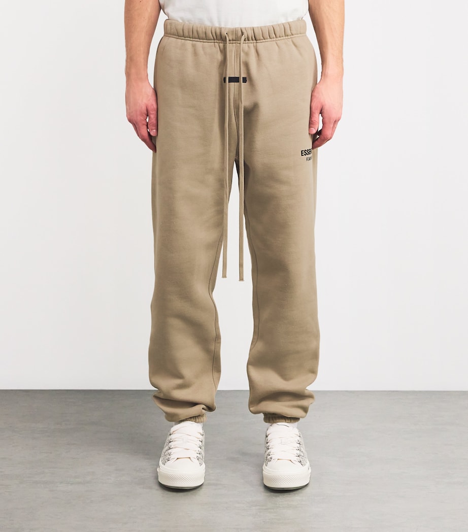 FEAR OF GOD ESSENTIALS Mens Cotton-Blend Logo Sweatpants Desert Sand Image 3