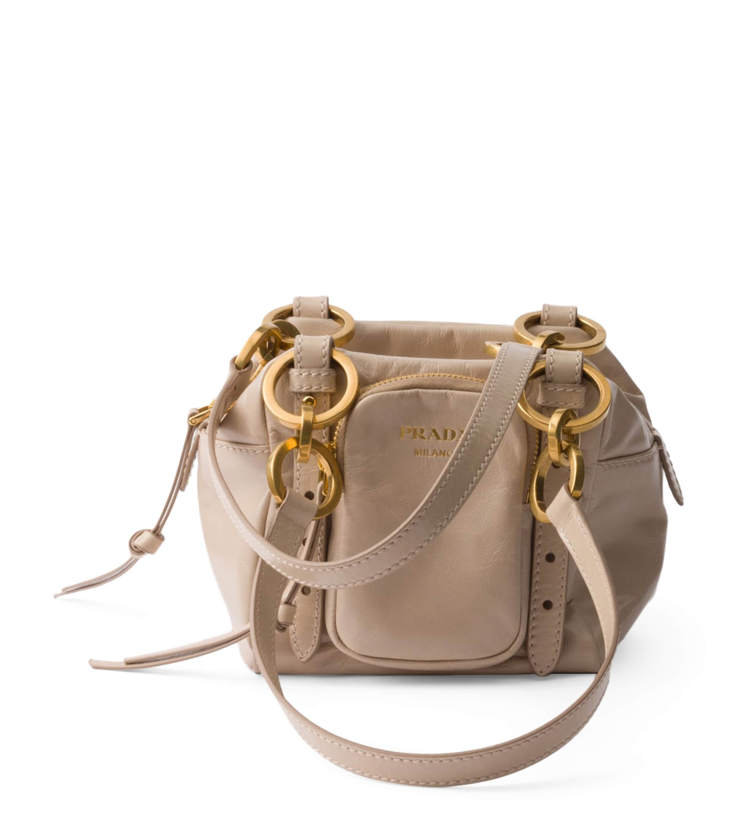 Prada Mini Leather Dangle Top-Handle Bag | Harrods UK