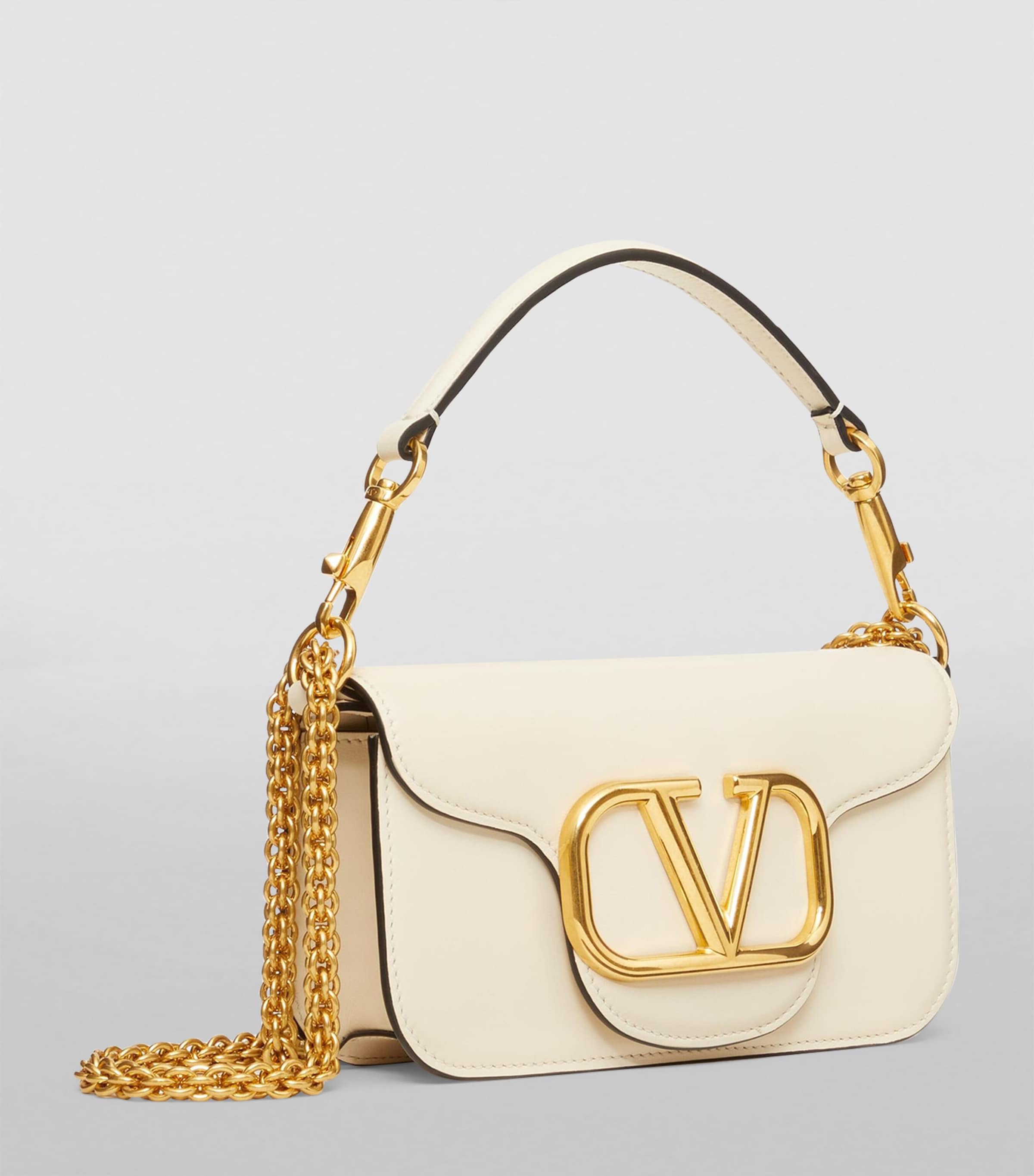 Valentino Garavani Small Leather Locò Shoulder Bag | Harrods US