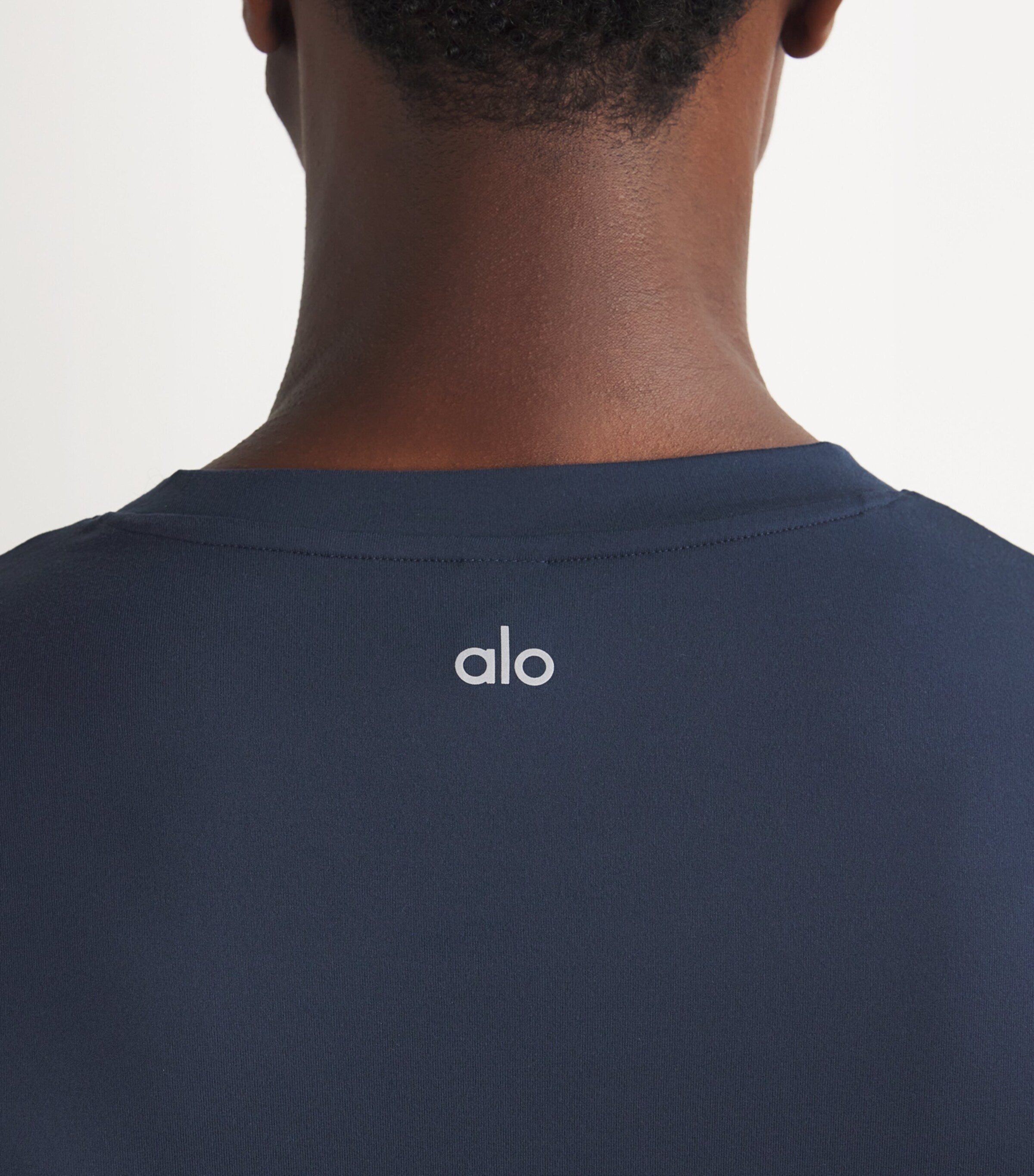 Alo Yoga Navy Conquer Reform T-Shirt | Harrods UK