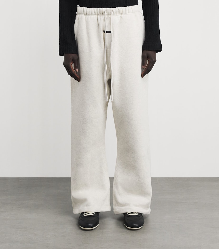 FEAR OF GOD ESSENTIALS Mens Cotton-Blend Signature Flared Sweatpants Oatml Hthr/lght Hthr Image 4