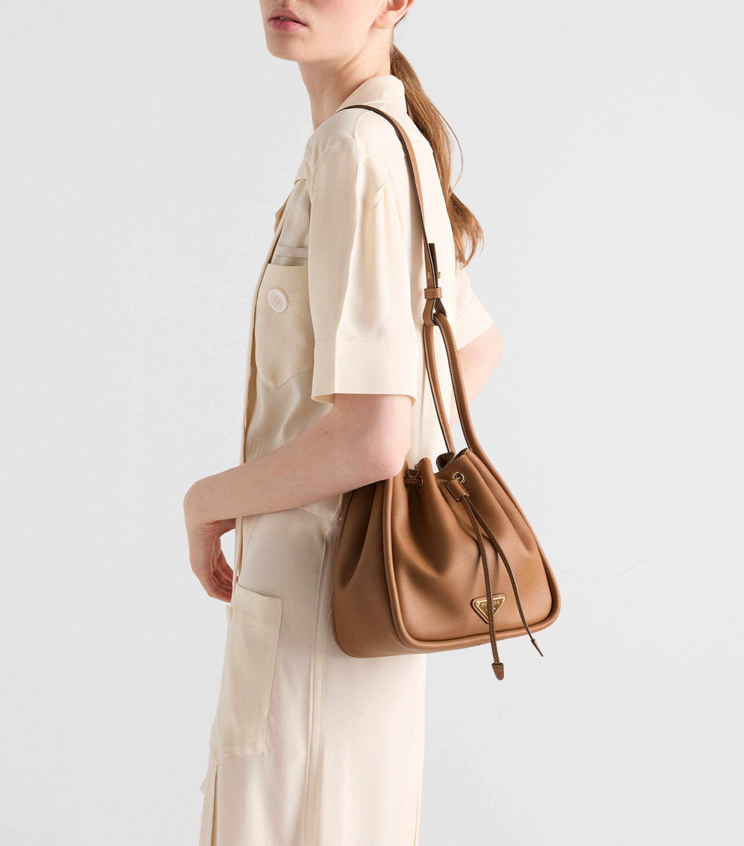 Prada Mini Leather Darling Bucket Bag | Harrods UK
