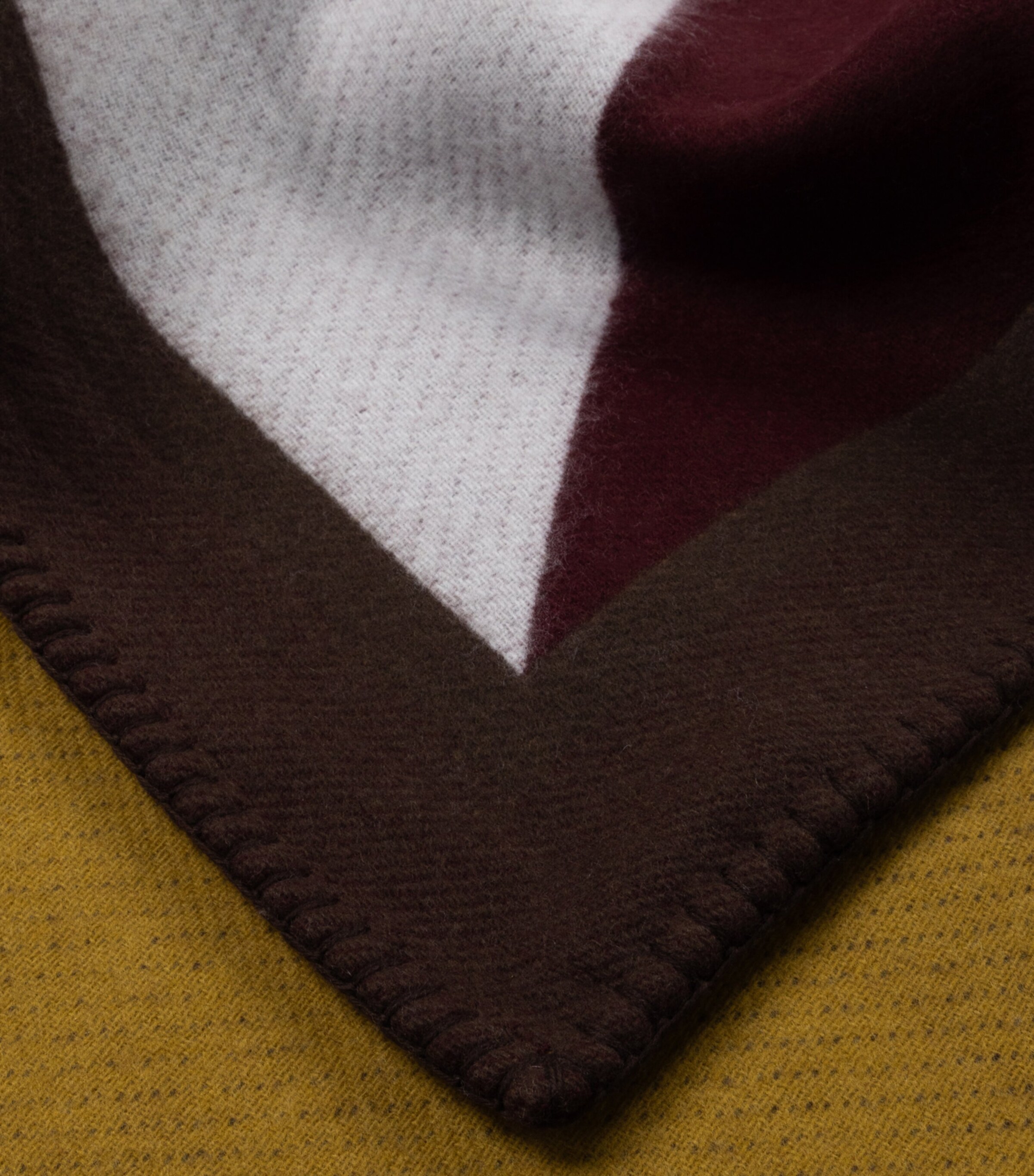 Begg x Co Lambswool-Cashmere Vivian Envelope Blanket (140cm x 180cm) Burgundy Ochre Image 2