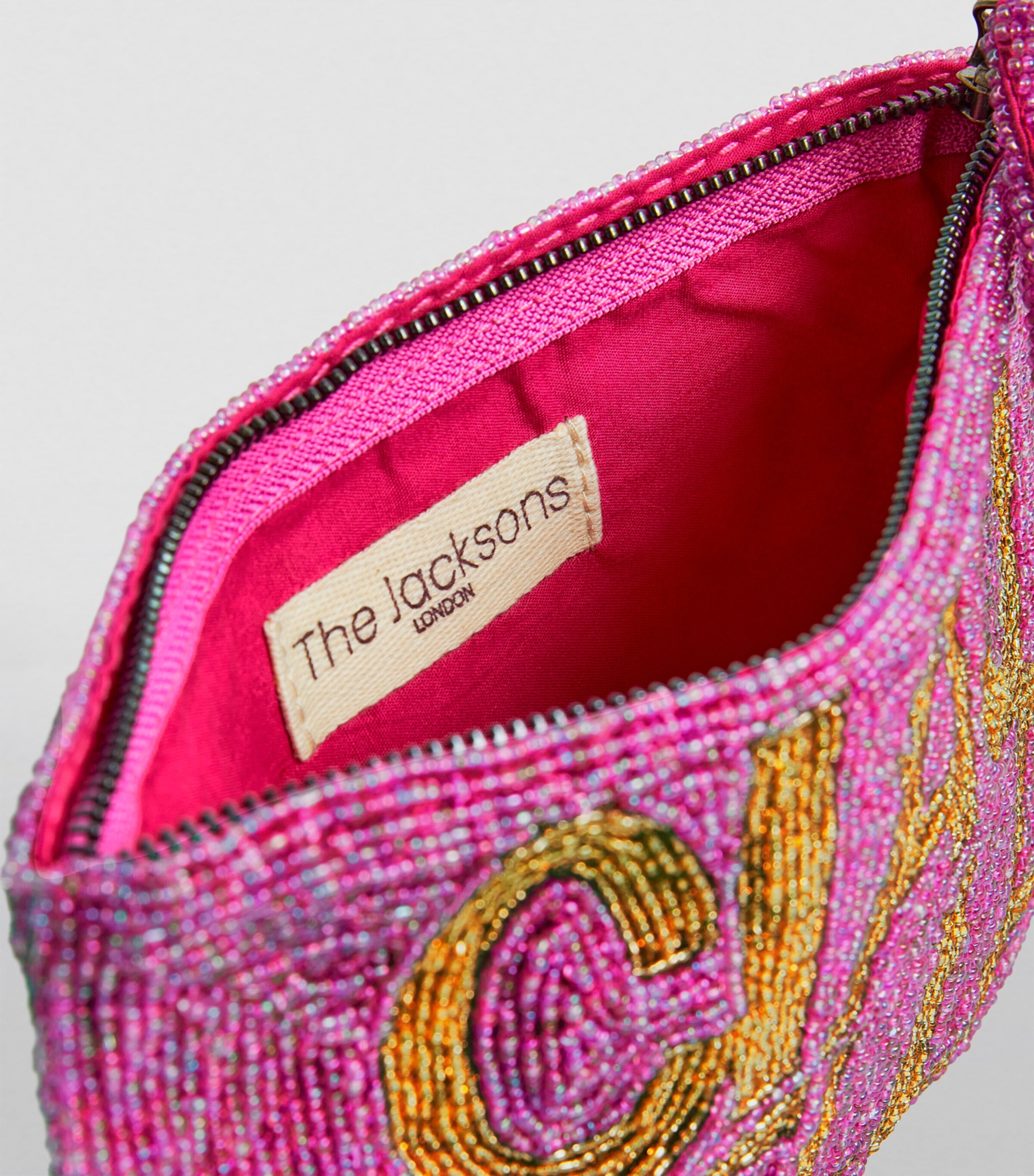 the Jacksons Pink Beaded Ciao Bella Clutch Bag | Harrods UK