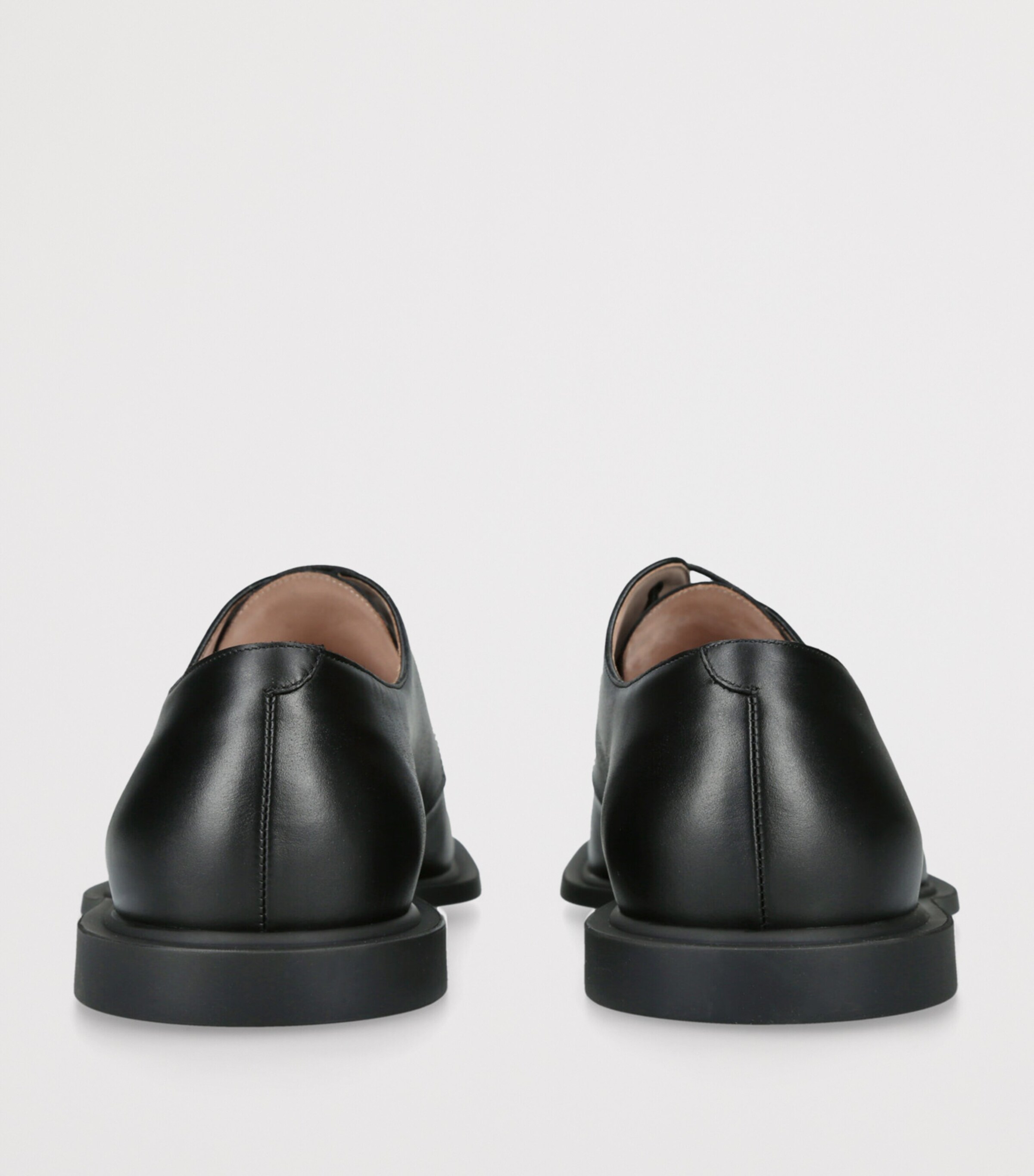 The Row Black Nic Leather Derby Shoes | Harrods US