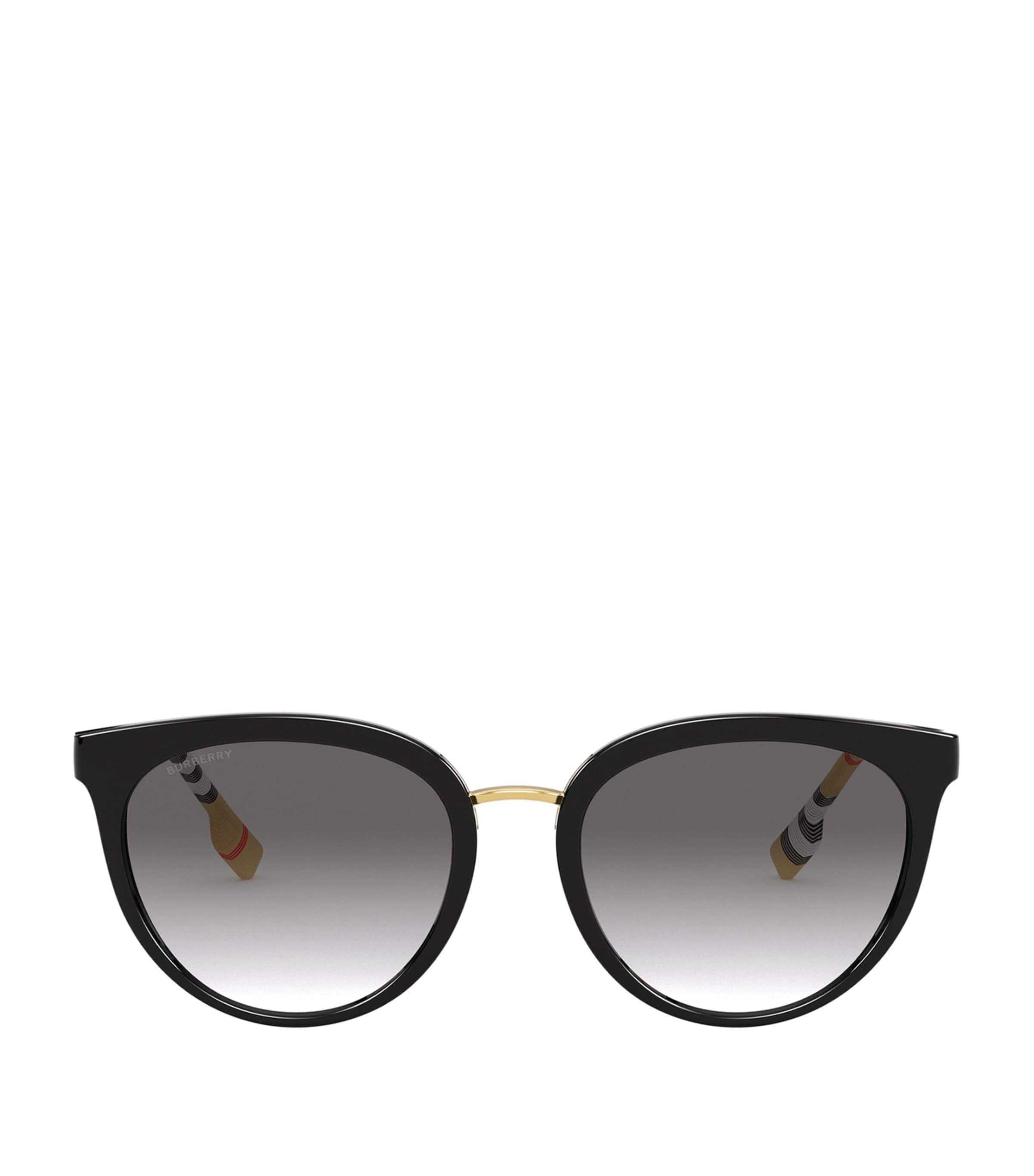 Shop Burberry Round Sunglasses In Black