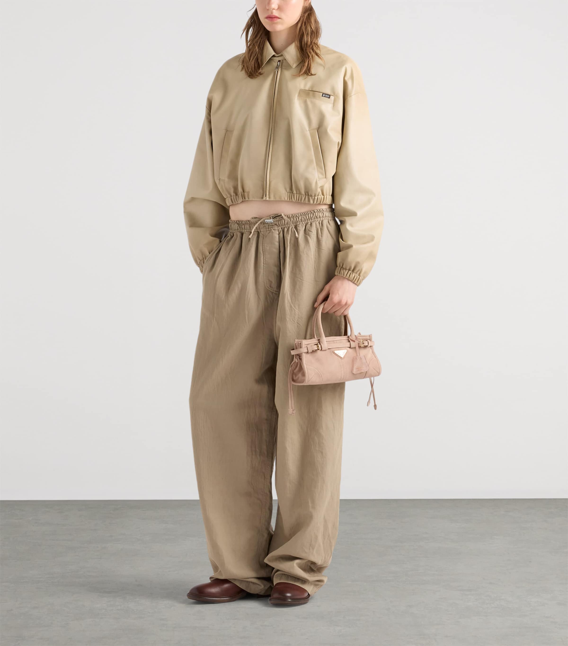Prada Nude Mini Suede Bonnie Top-Handle Bag | Harrods UK