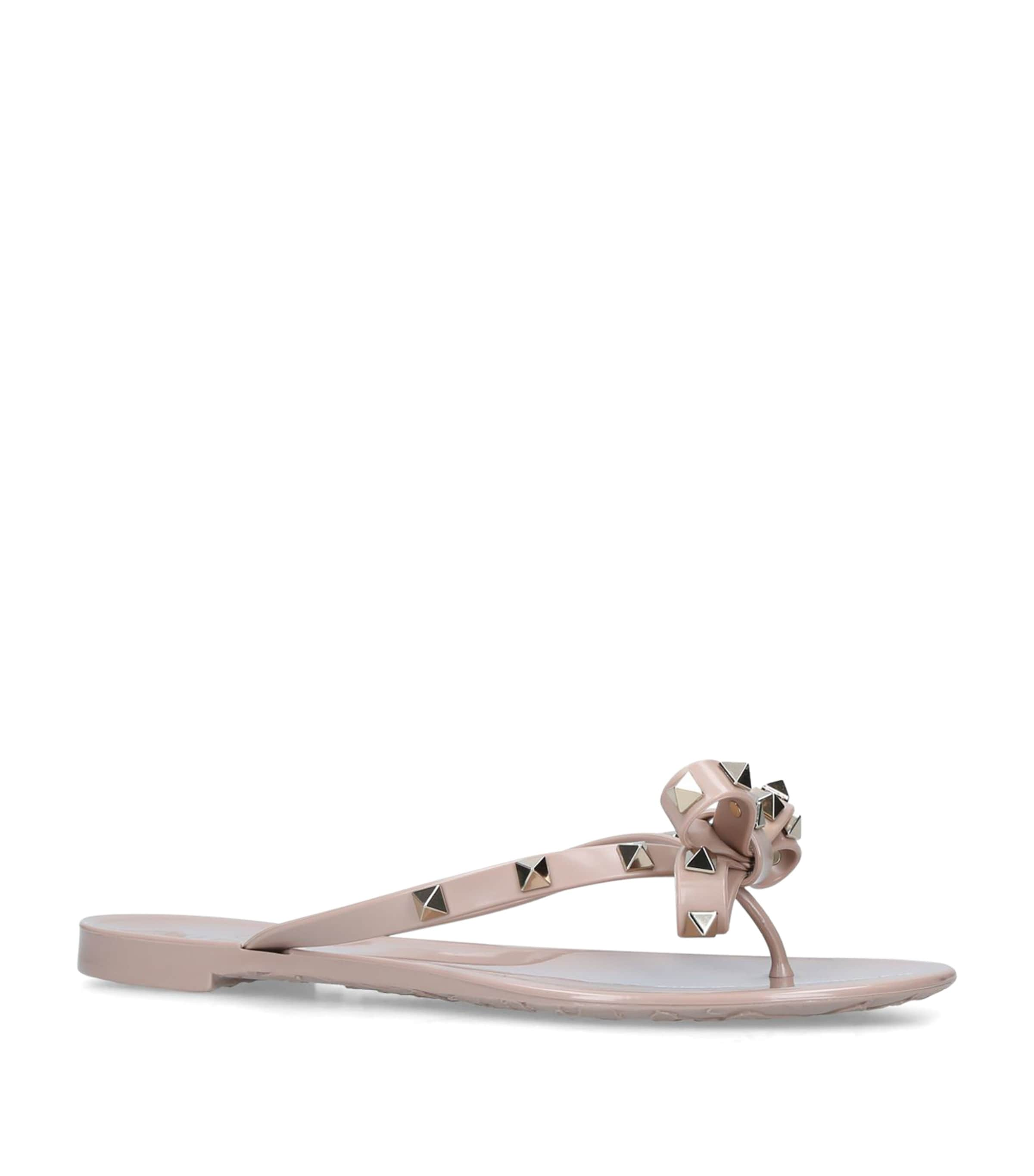 Shop Valentino Rockstud Flip Flops In Nude