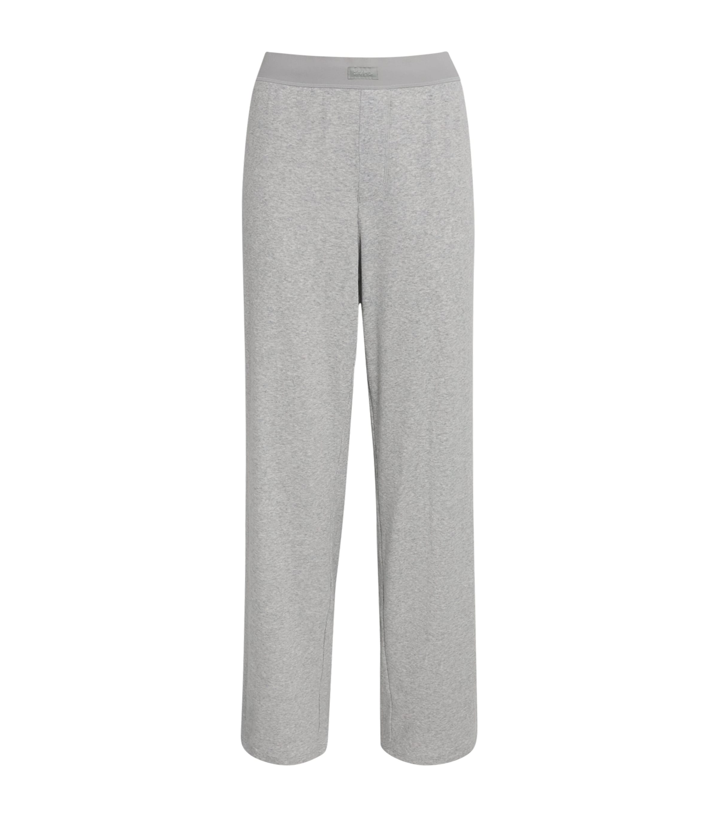 Skims Stretch-cotton Ribbed Trousers In Gray