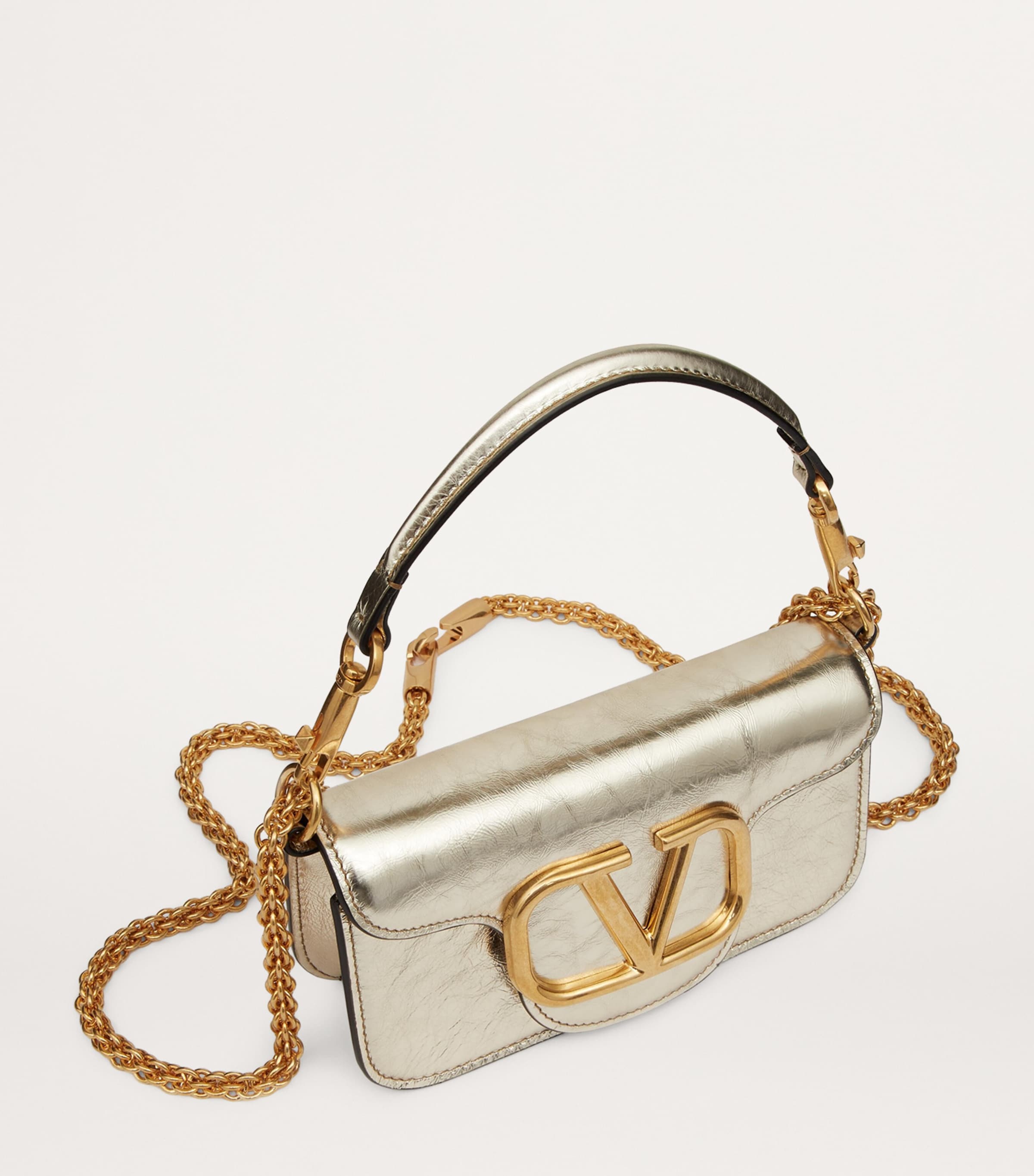 Valentino Garavani Small Leather Locò Shoulder Bag | Harrods US