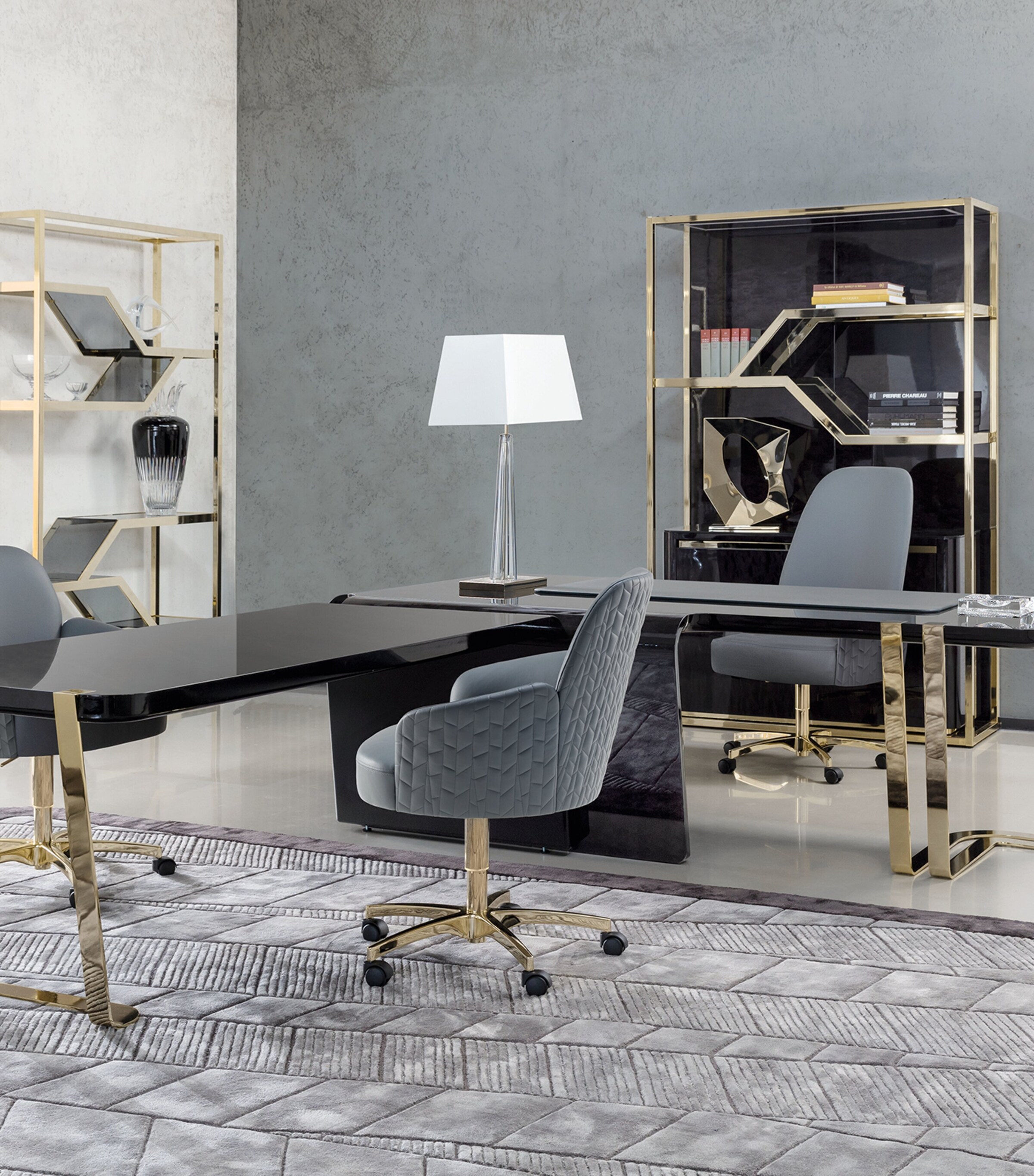 Charisma desk with adjoining shelves and lamp in silver/black room