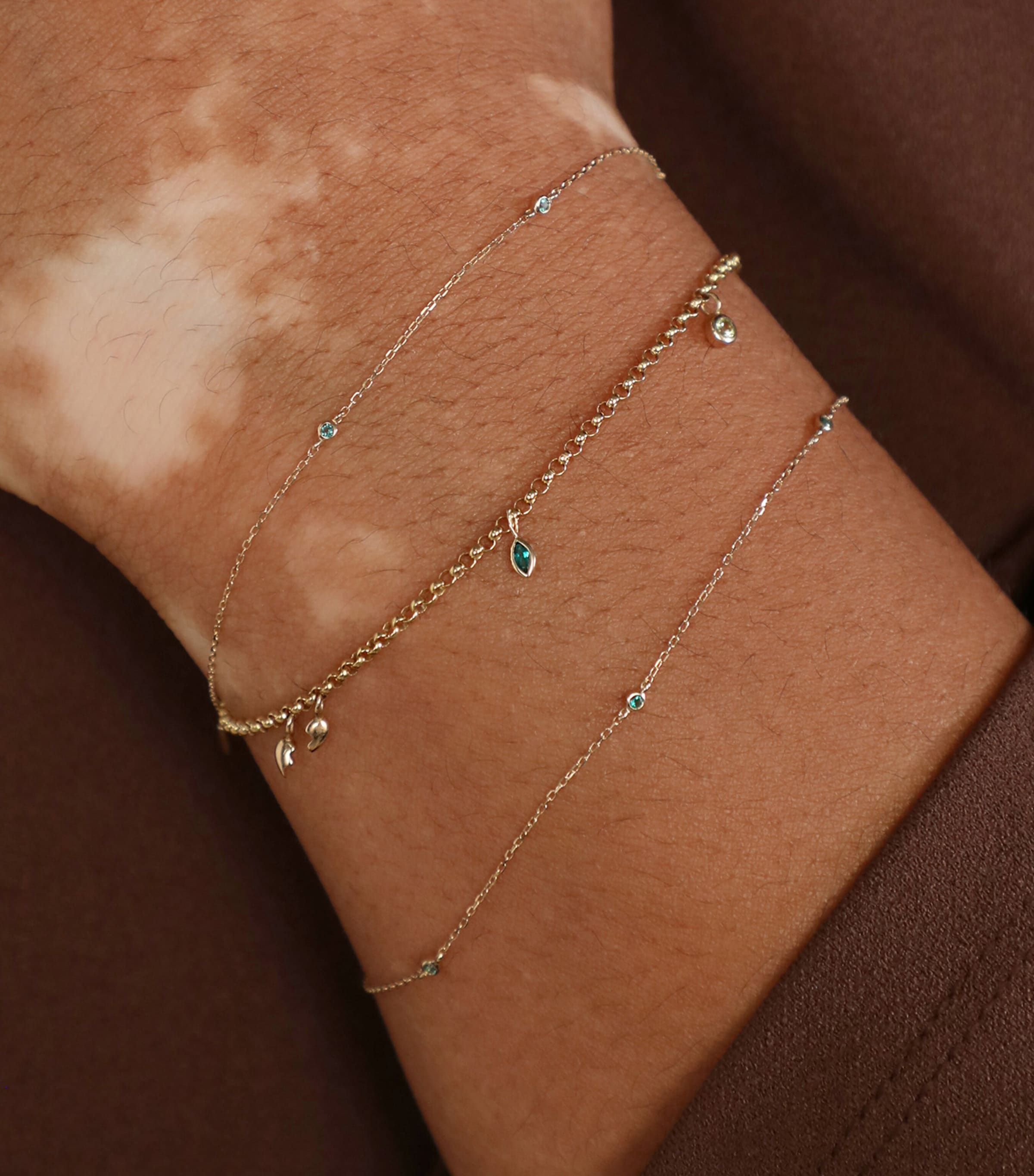 Astrid & Miyu Yellow Gold and Emerald Charm Bracelet Gold Image 2