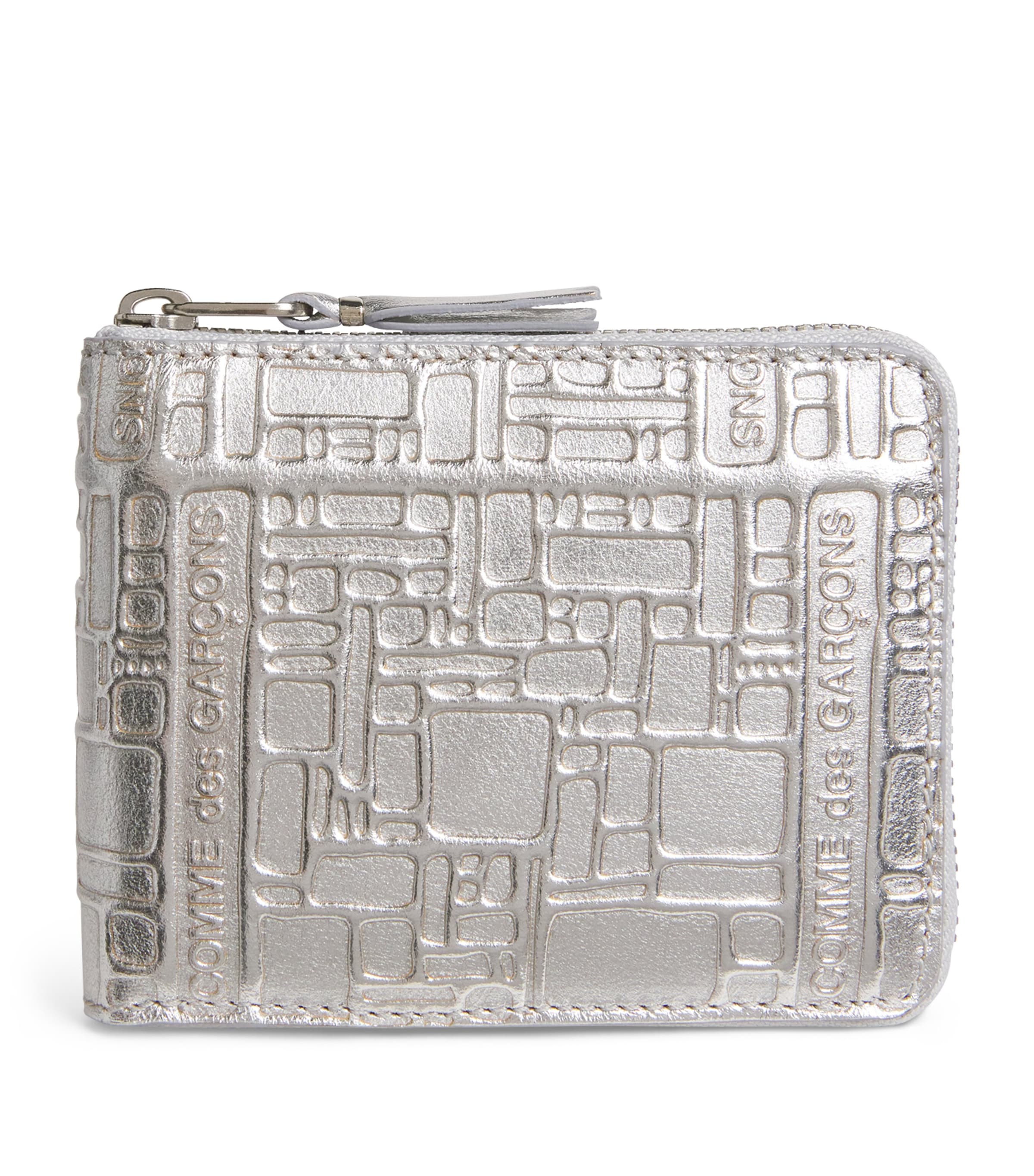 Comme Des Garçons Leather Embossed Logo Zipped Wallet In Silver