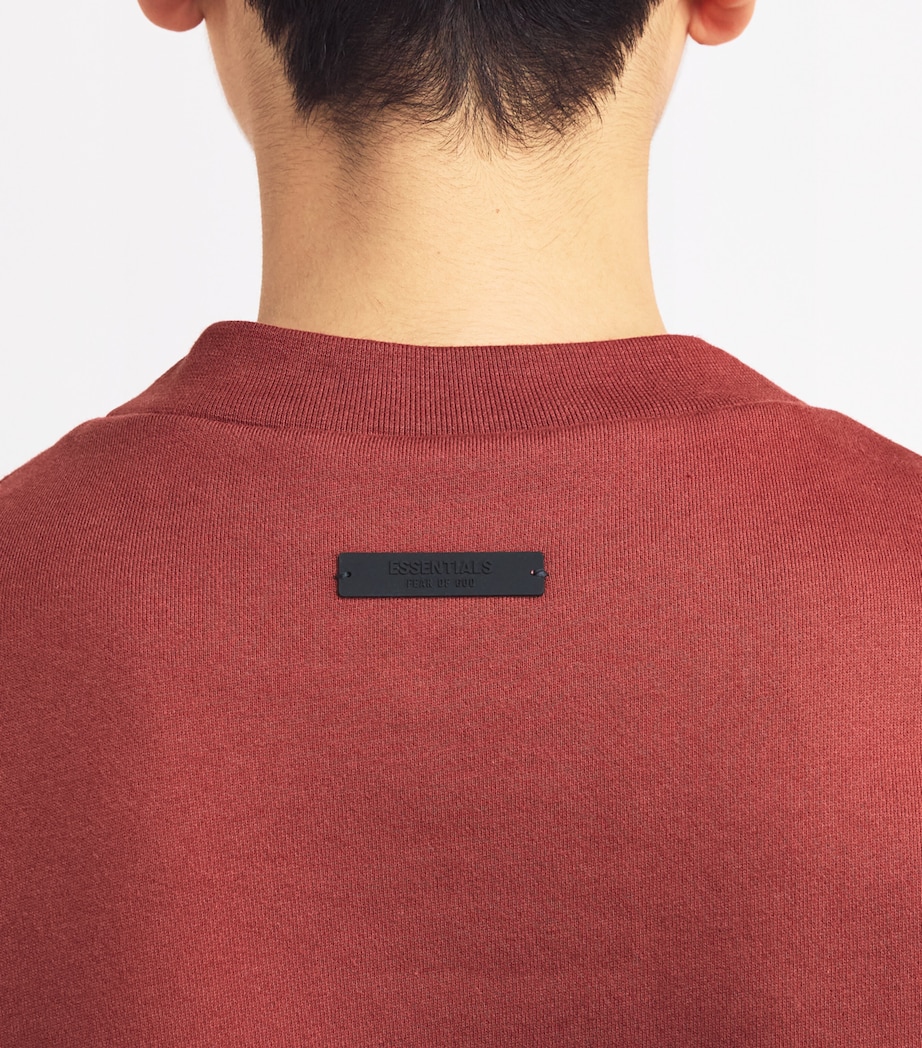 FEAR OF GOD ESSENTIALS Mens Cotton-Blend University Crest Logo Sweatshirt Crimson Image 6