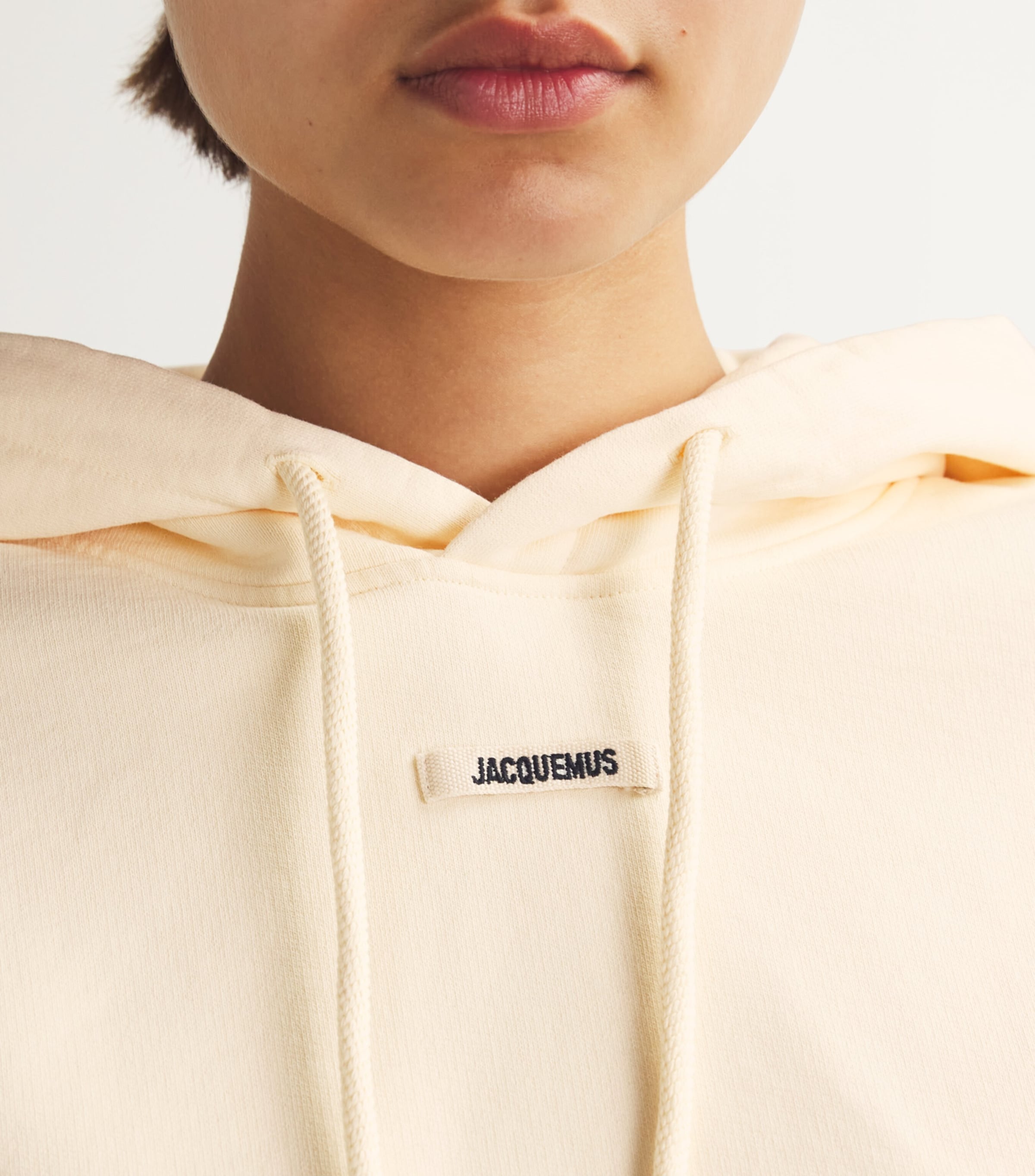 Jacquemus Ivory Cotton Cropped Grosgrain Logo Hoodie | Harrods US