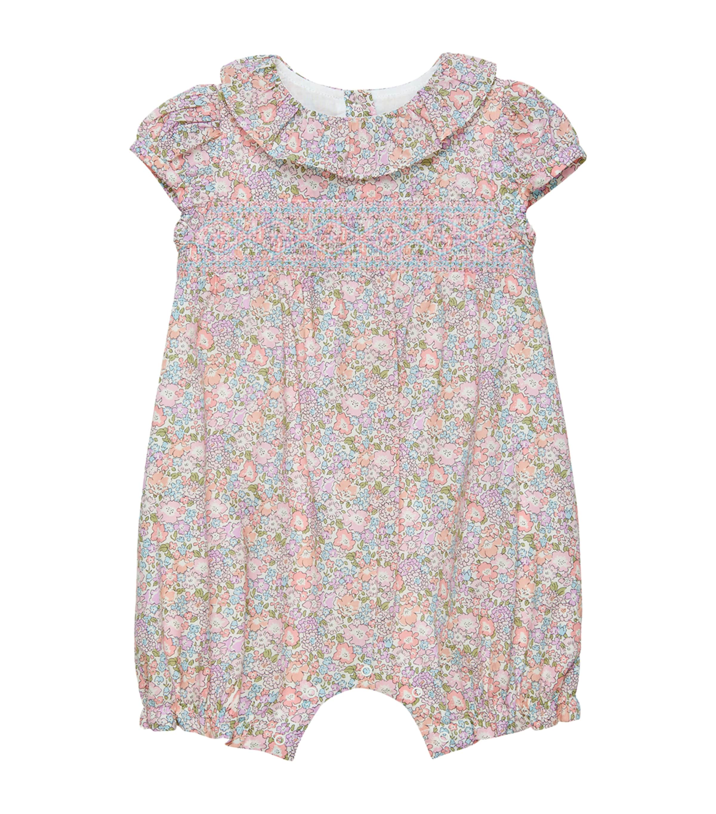 Shop Trotters Smocked Michelle Romper In Pink