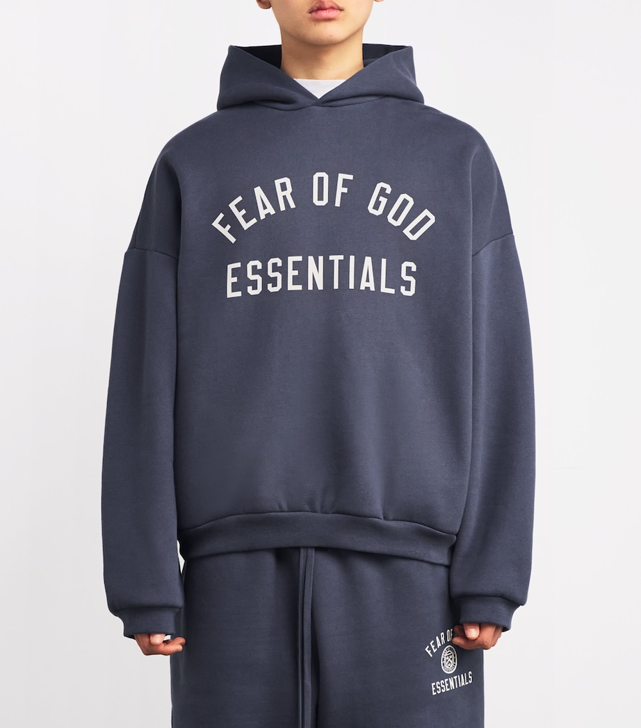 FEAR OF GOD ESSENTIALS Mens Cotton-Blend Logo Print Hoodie Marine Image 3