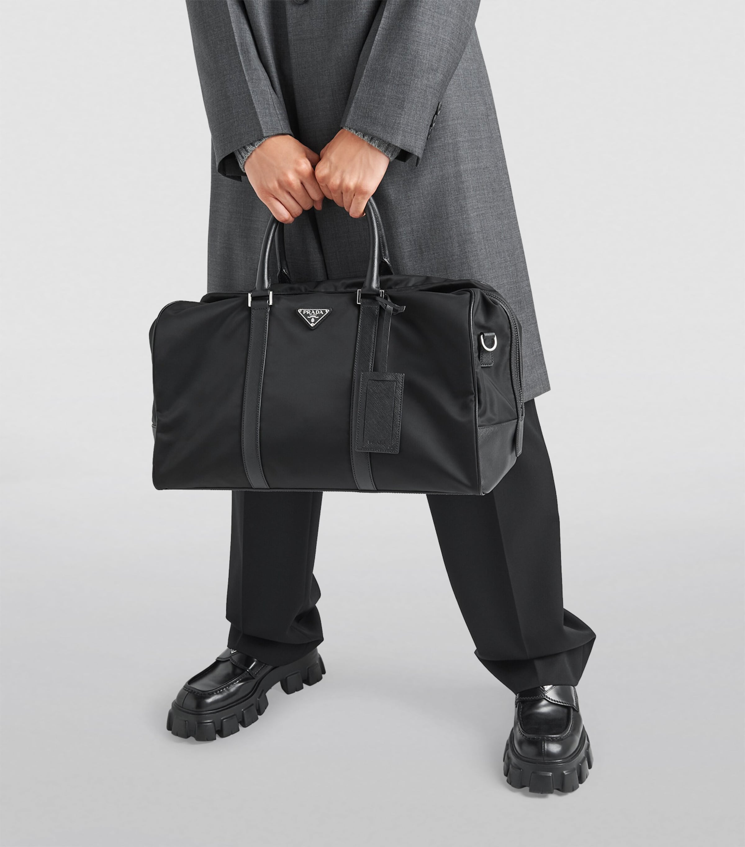 Prada Black Re-Nylon Duffle Bag | Harrods UK Prada Black Re-Nylon Duffle Bag | Harrods UK