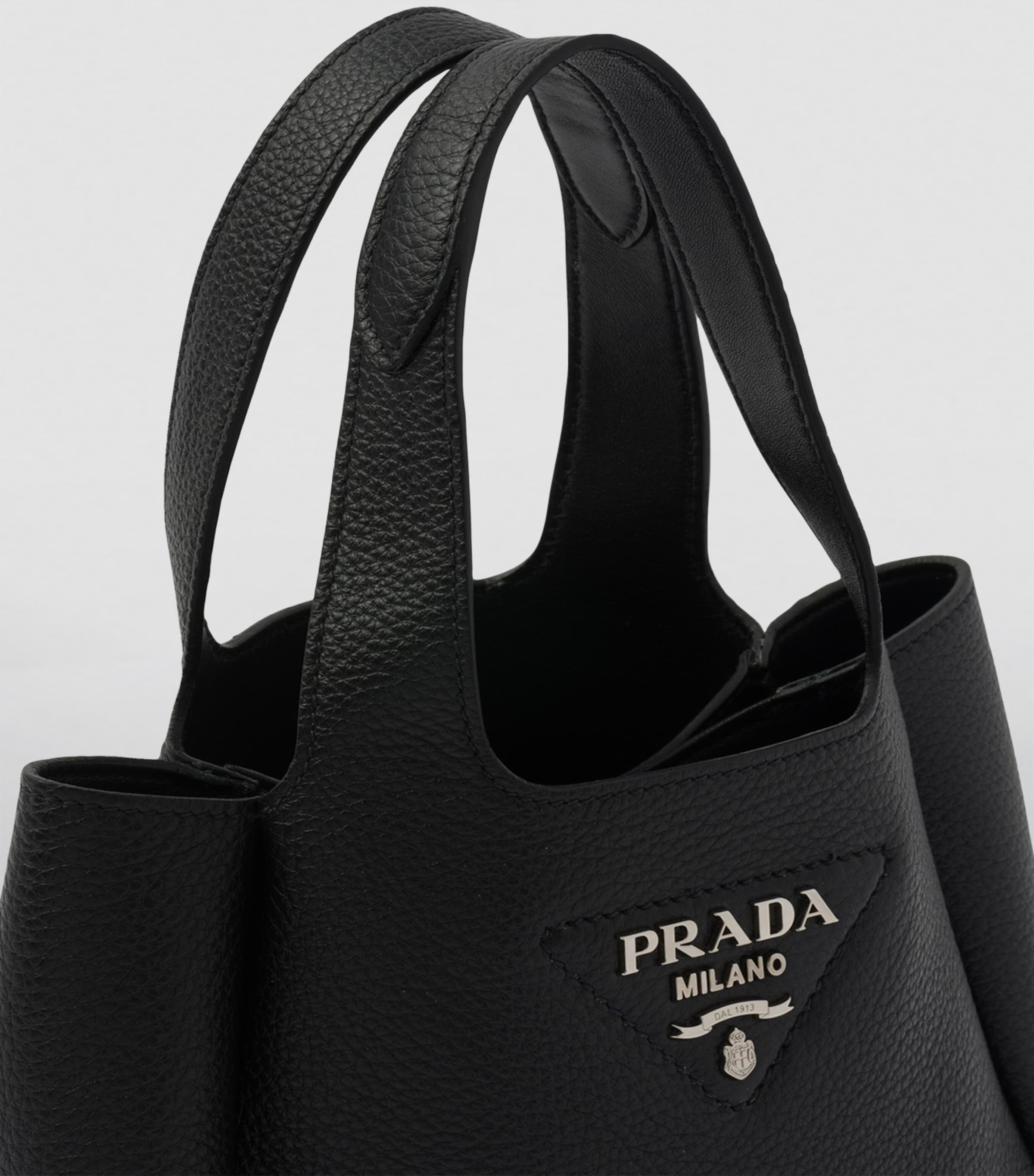 Prada Mini Leather Bucket Bag | Harrods UK