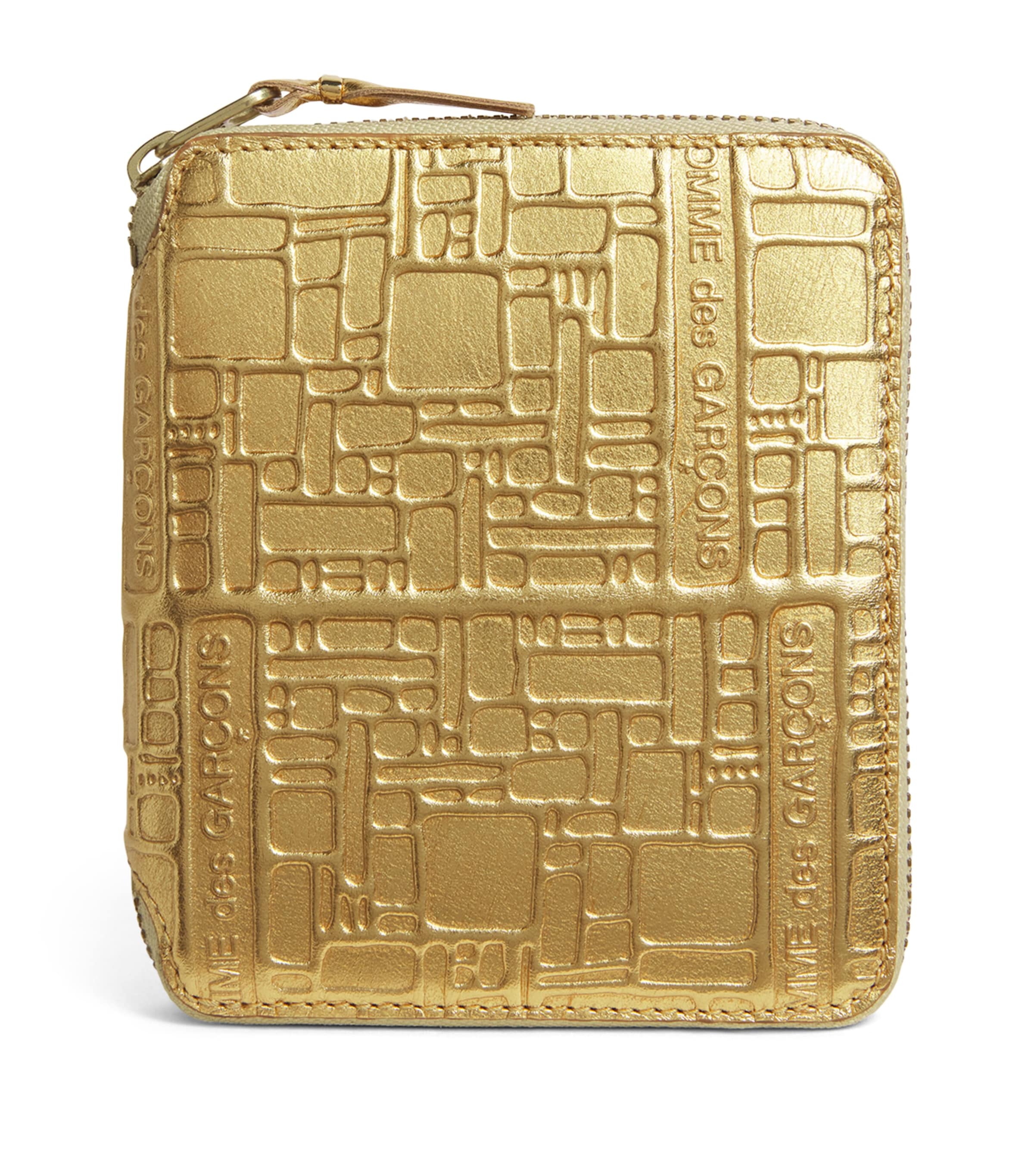 Comme Des Garçons Leather Embossed Logo Zipped Wallet In Gold