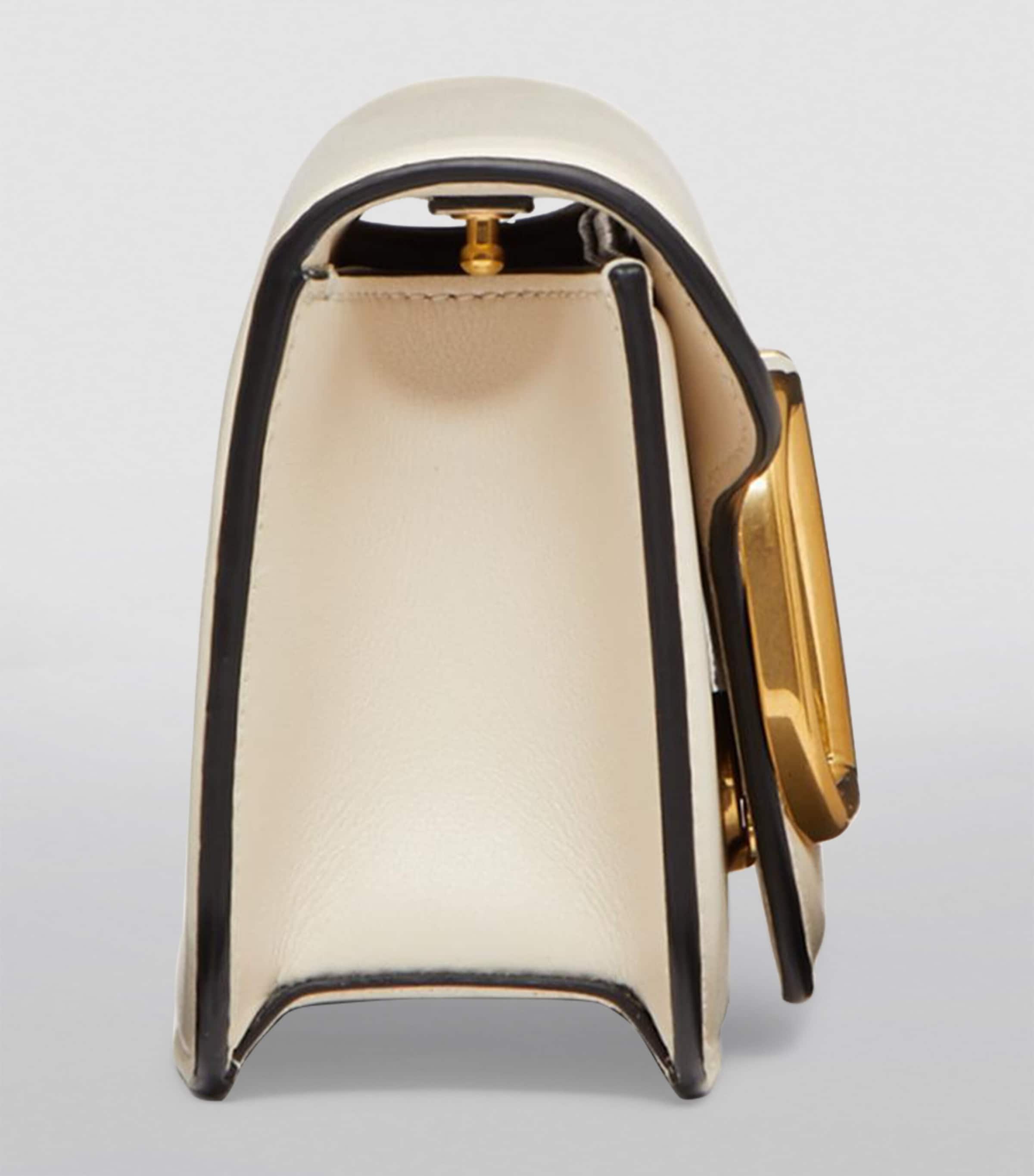 Valentino Garavani Small Leather Locò Shoulder Bag | Harrods US
