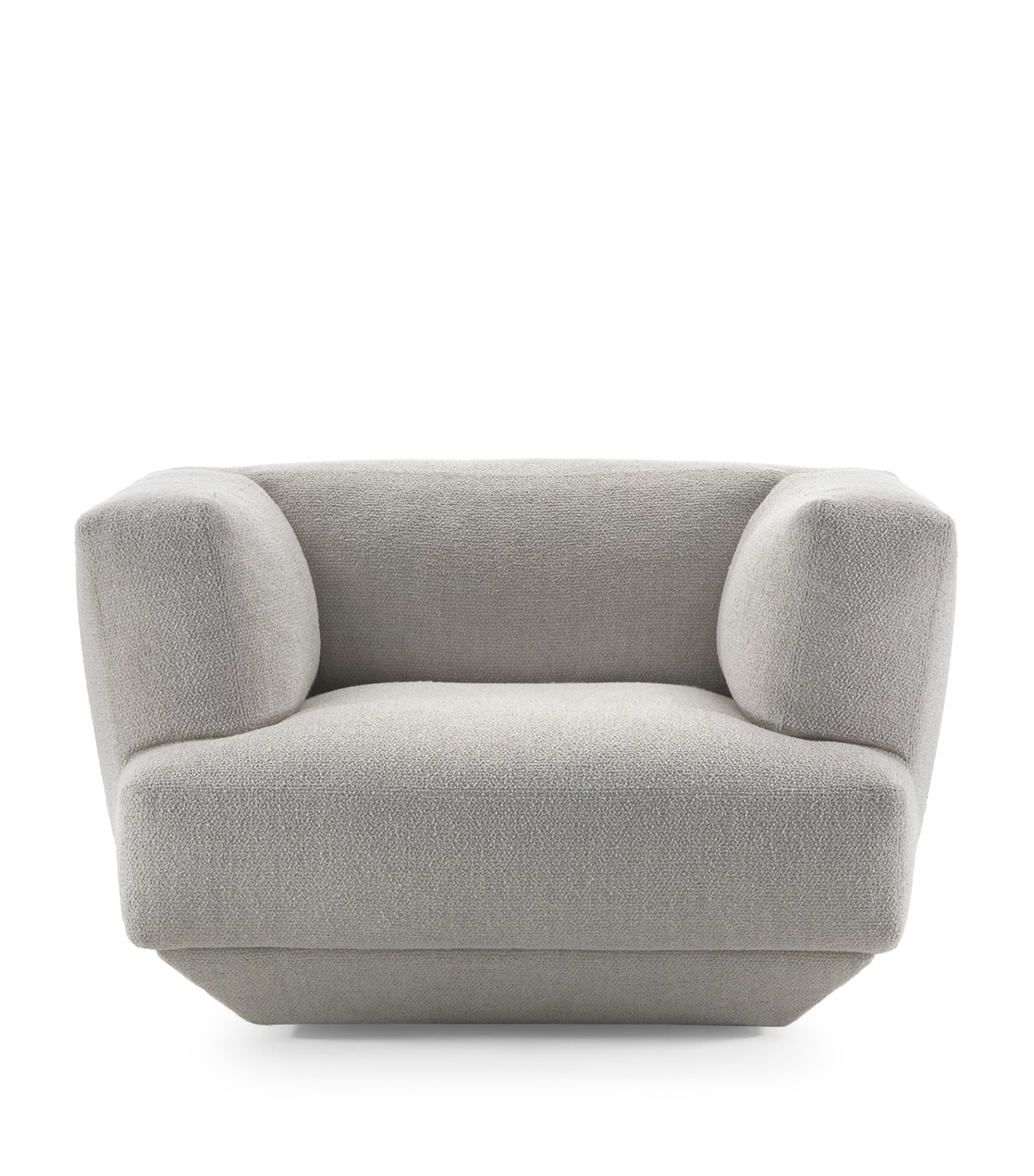 Light grey swivelling armchair close-up