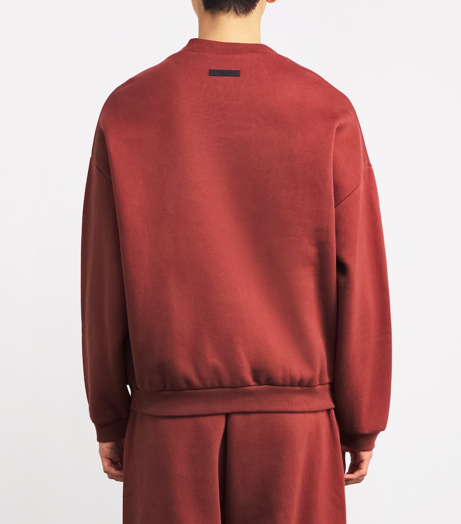 FEAR OF GOD ESSENTIALS Mens Cotton-Blend University Crest Logo Sweatshirt Crimson Image 4