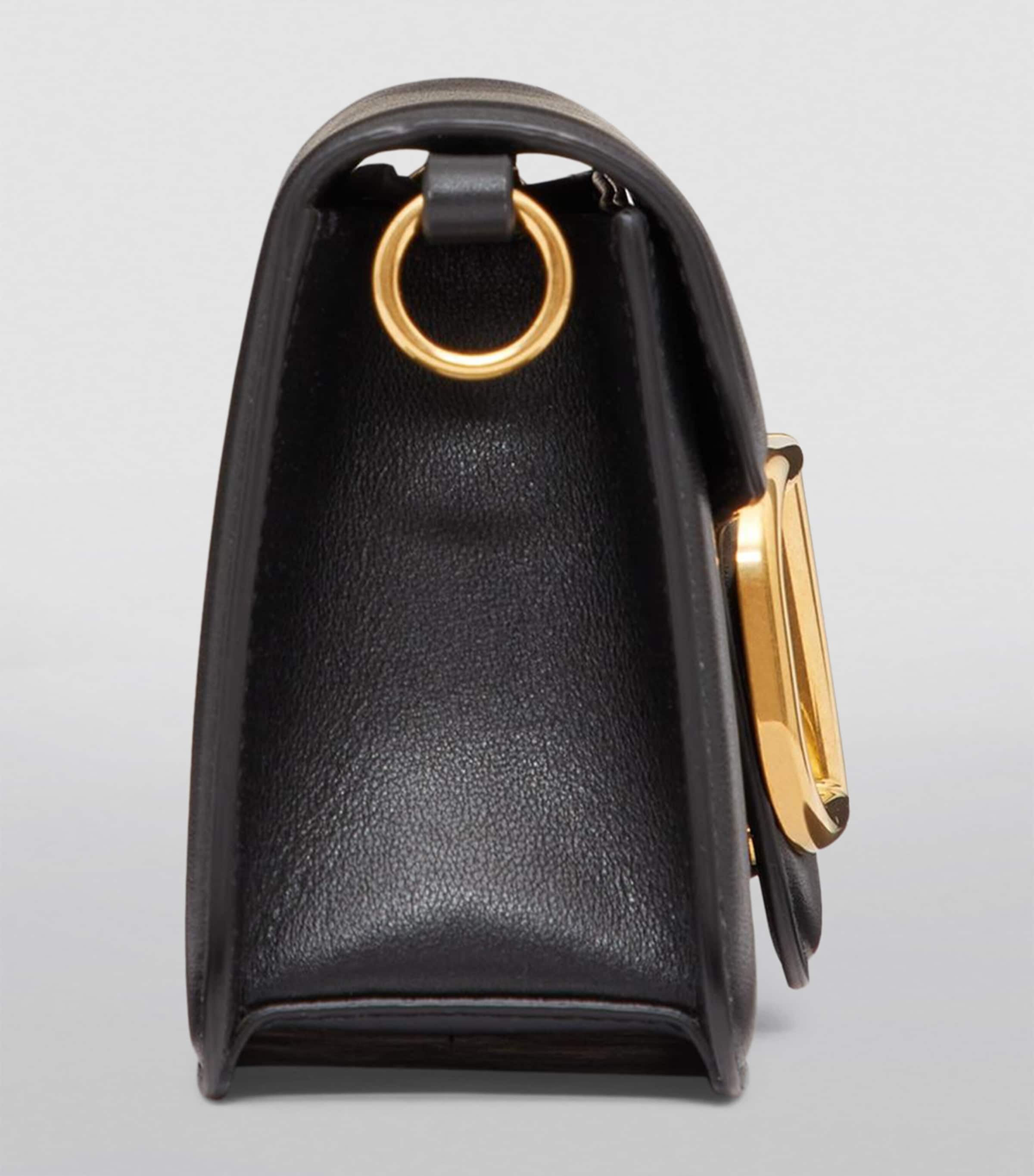 Valentino Garavani Leather Locò Shoulder Bag | Harrods US