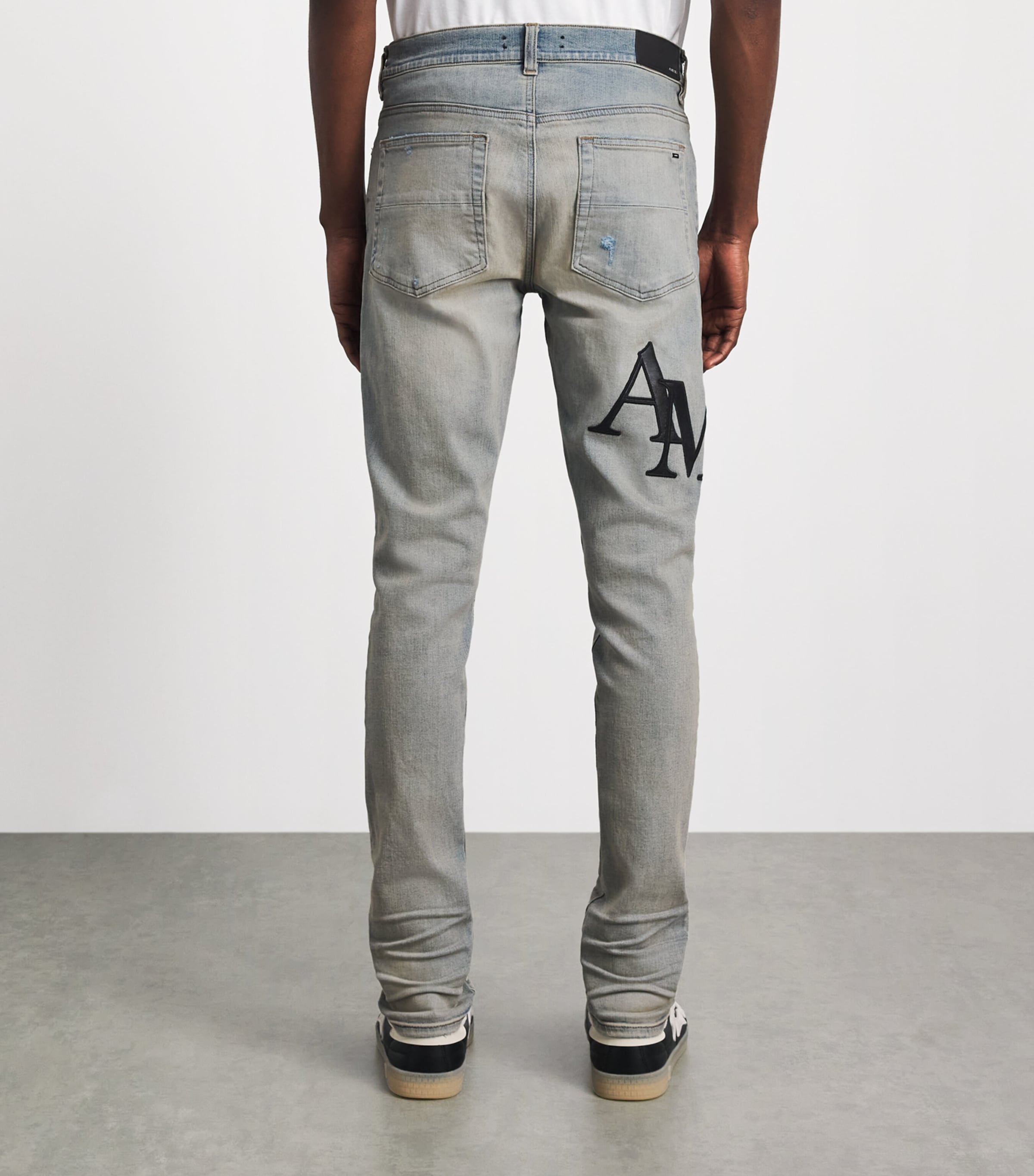 AMIRI Mens Staggered Logo Skinny Jeans Antique Indigo Black Image 5